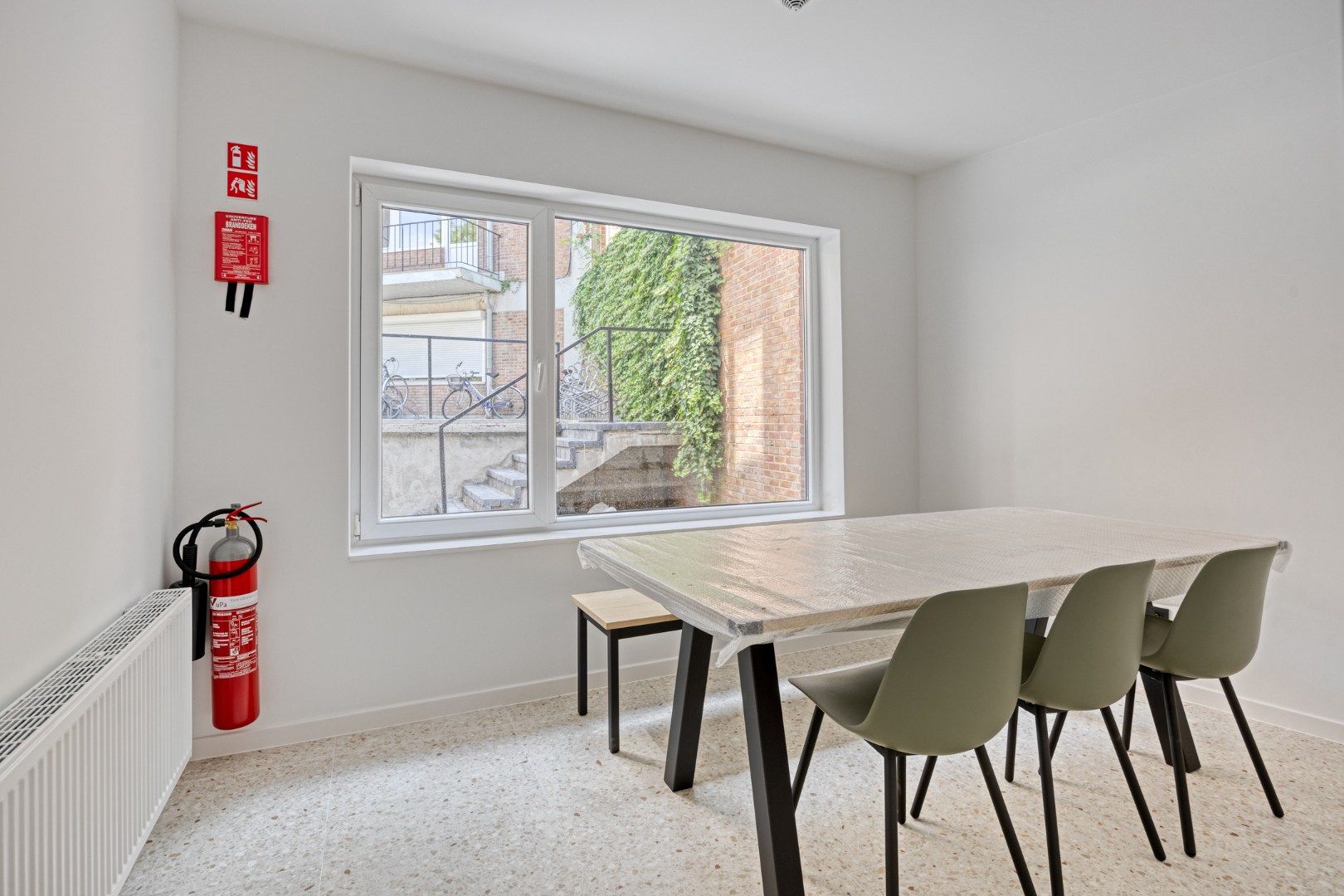 Volledig gerenoveerde studentenkamer in residentie met 29 studentenkamers met eigen sanitair en terras in hartje Leuven - EPC label A! foto 4