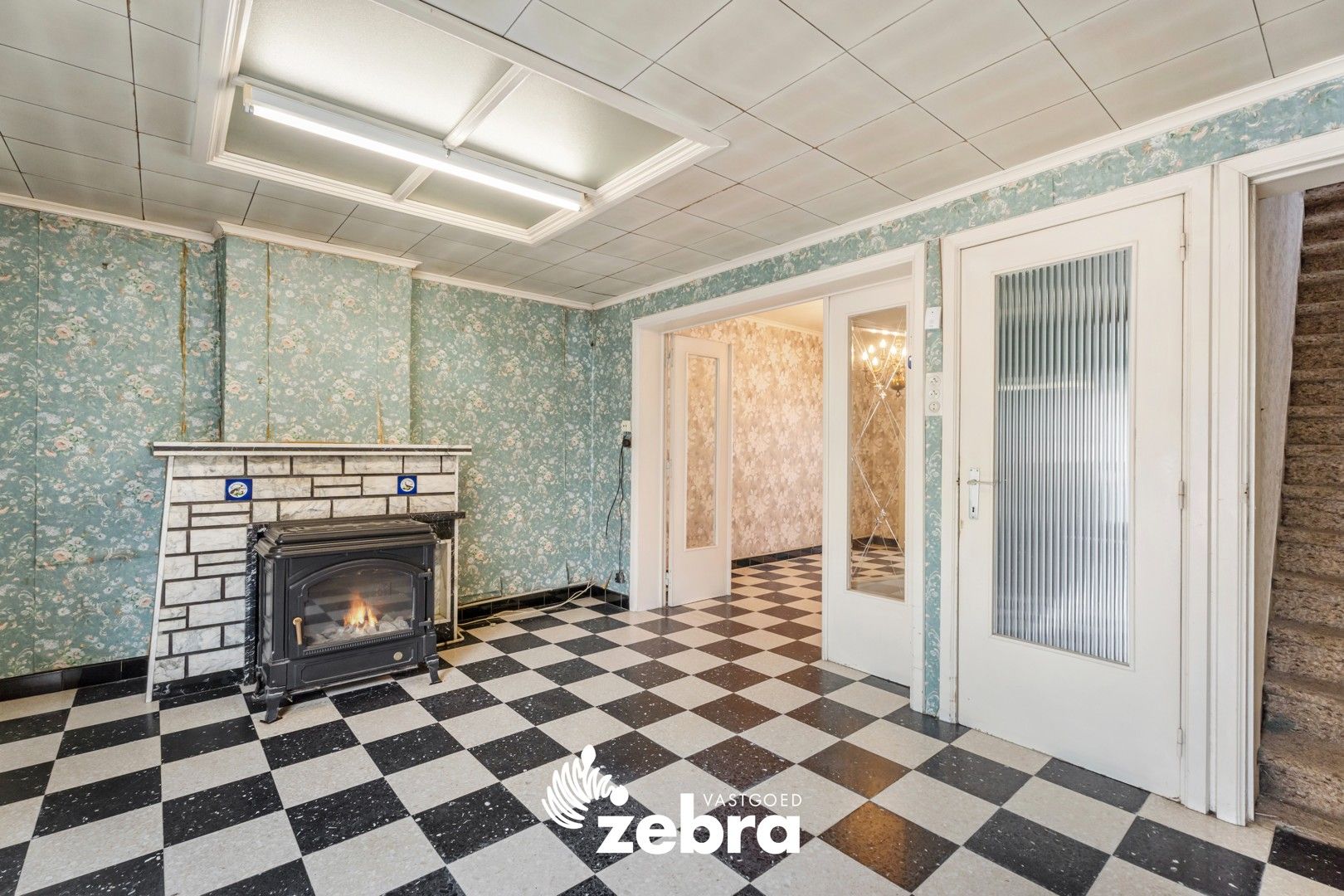 Te renoveren woning met 3 slaapkamers te Oostrozebeke! foto 5