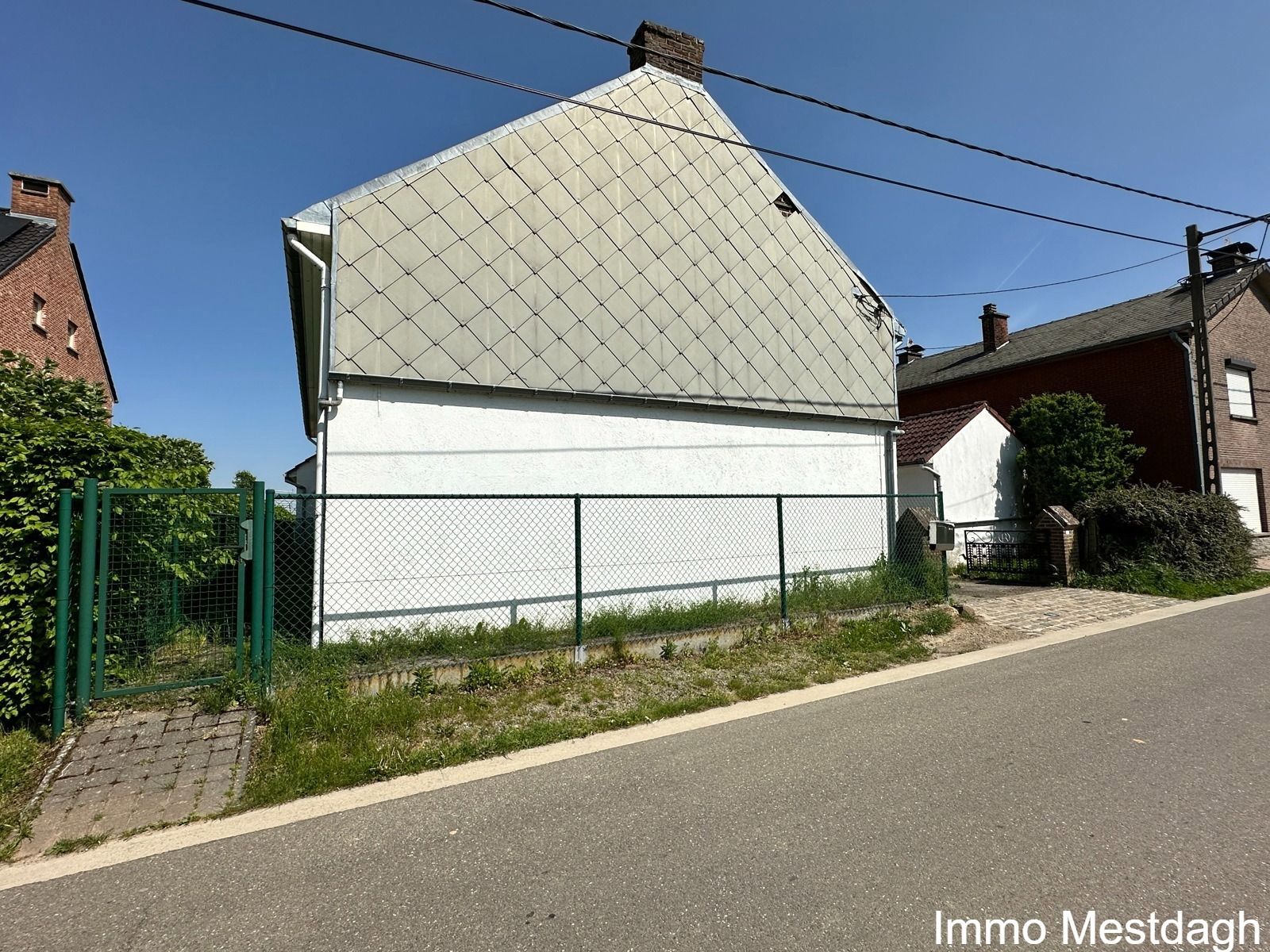 Ruime woning en tuinberging met potentieel in het landelijke Geetbets. foto 14