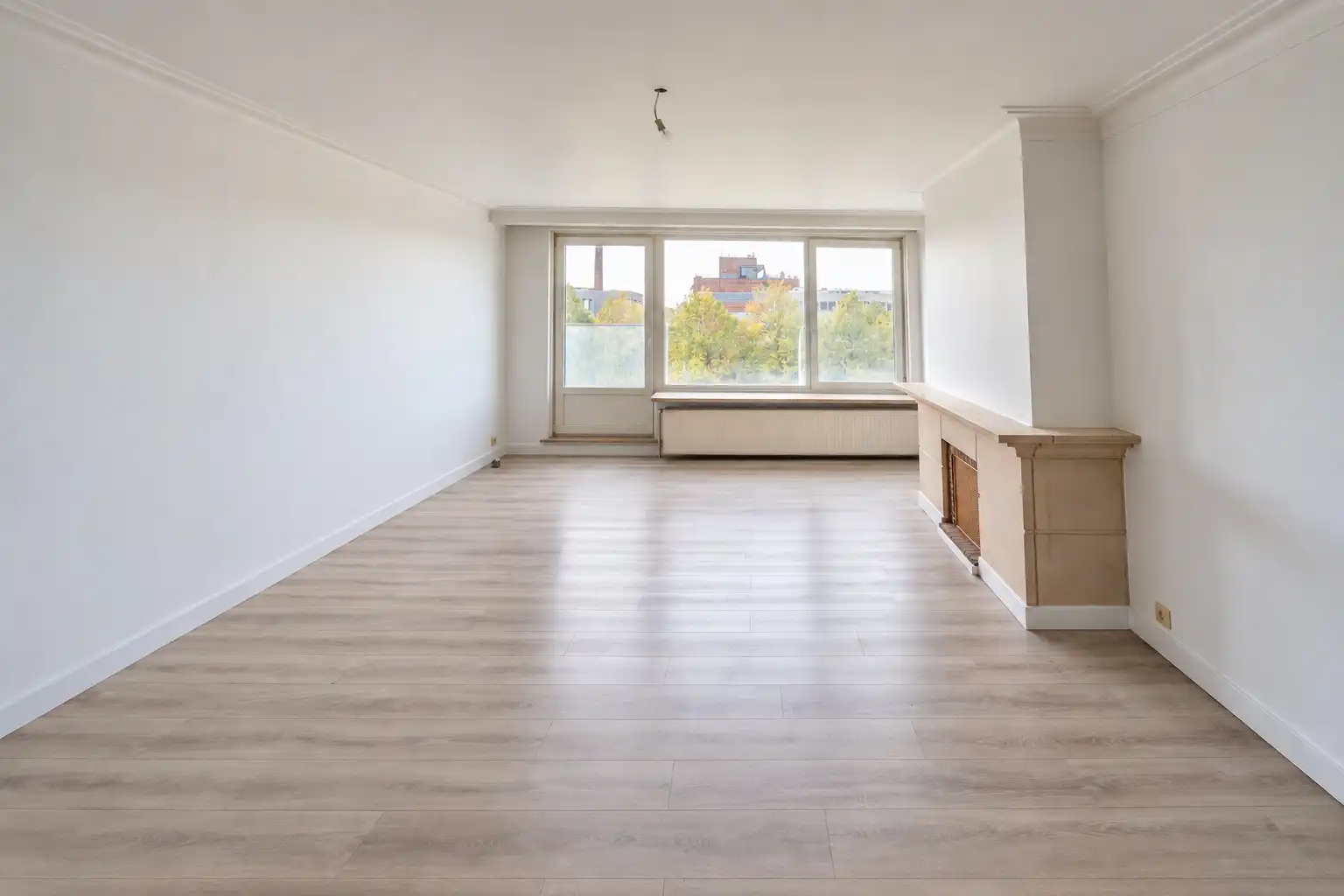 Ruim 3-slaapkamerappartement met garagebox foto 2