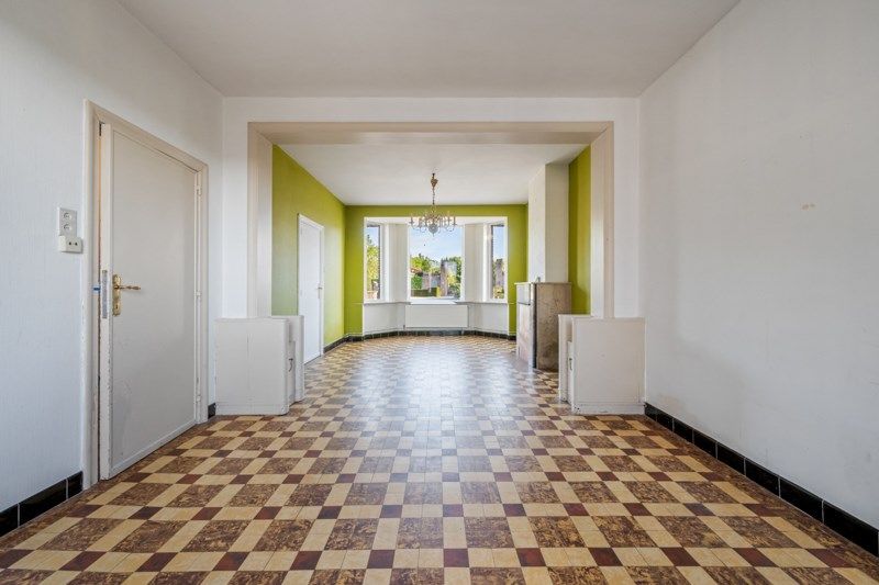 Te renoveren woning met een ruime tuin en zolder – een unieke kans! foto 4