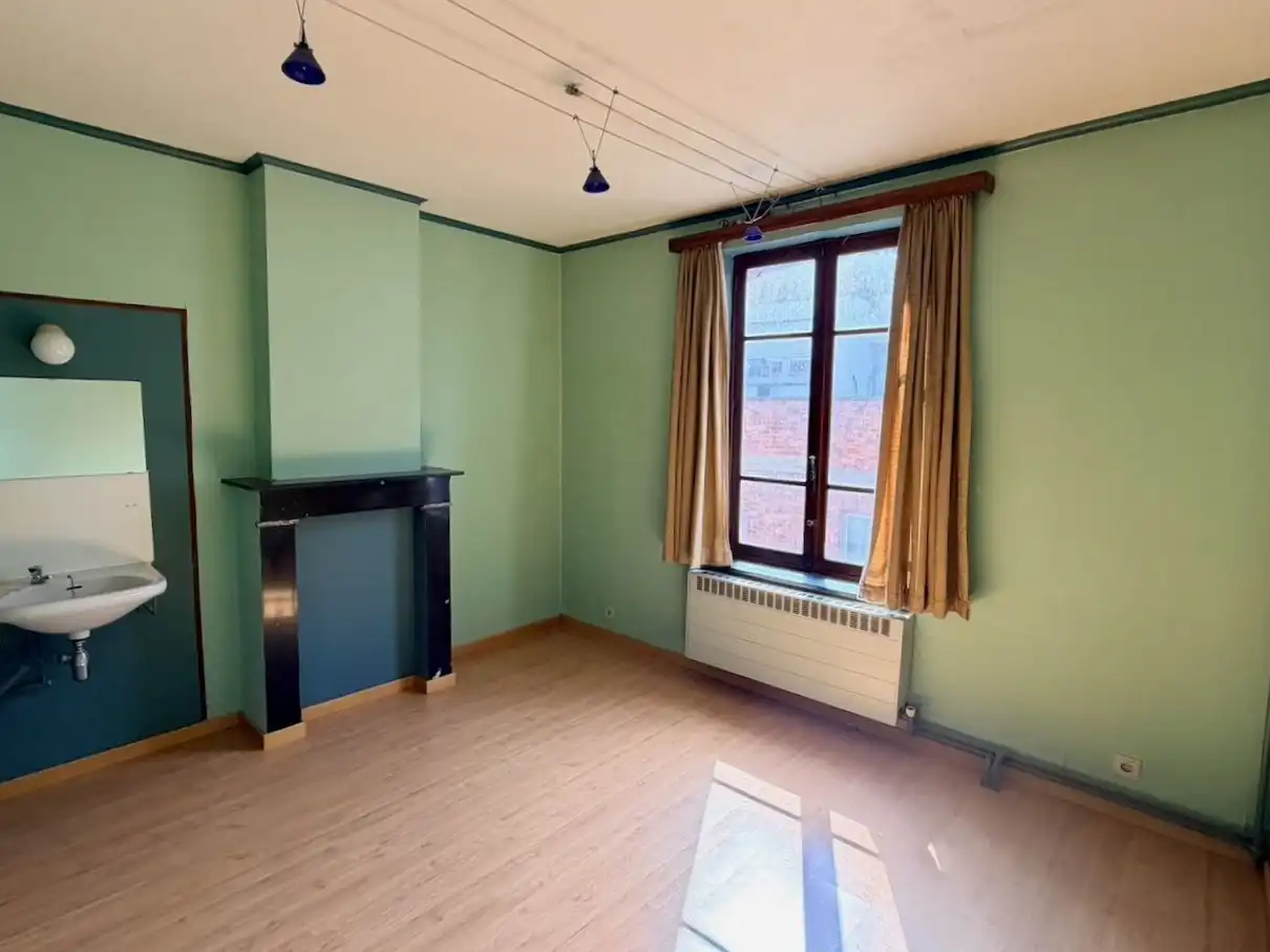 Ruime rijwoning met 4 slaapkamers, garage en tuin op toplocatie in Heverlee foto 13