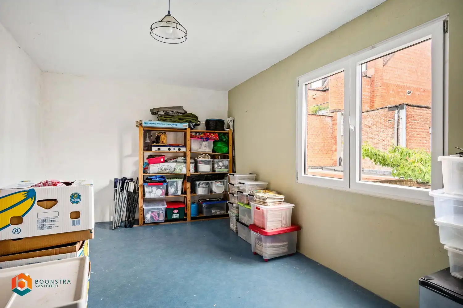 Instapklare woning met 4 slpkrs met gezellige stadstuin en garage foto 20