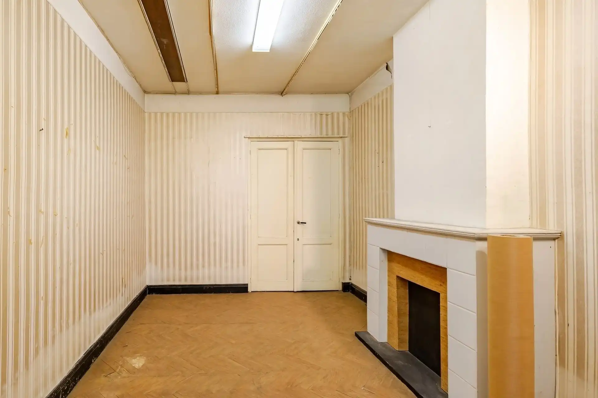 Te renoveren woning met 4 slaapkamers in centrum Wetteren foto 4