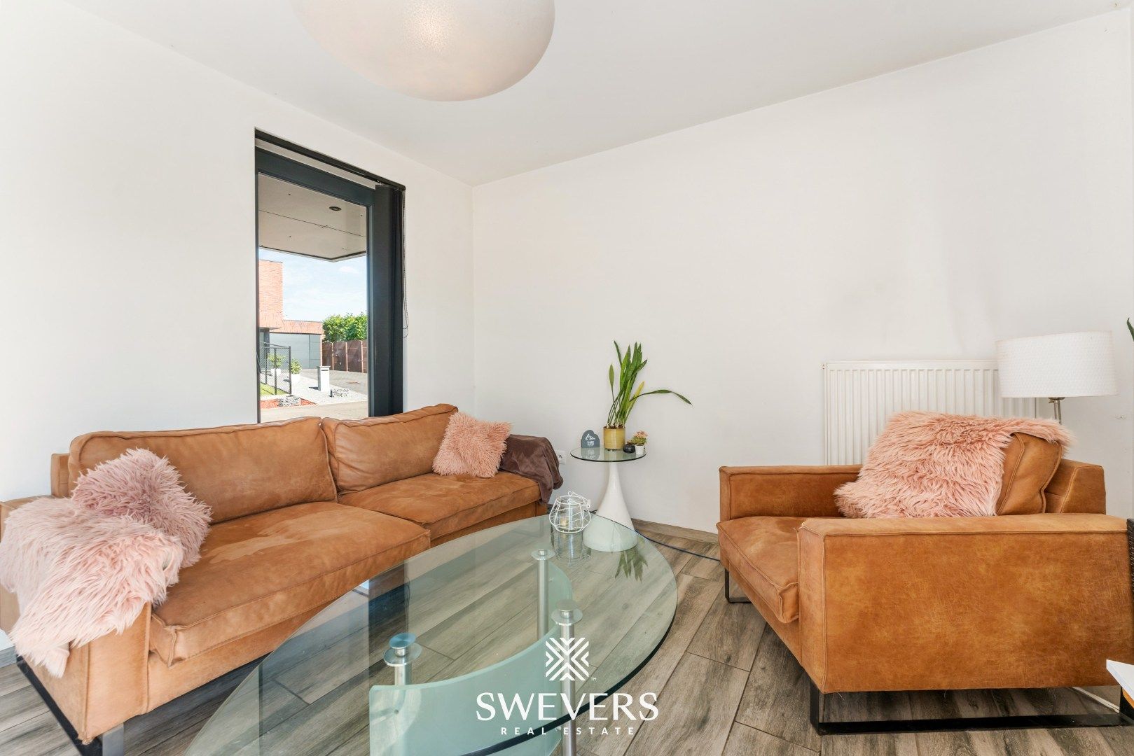Recente, instapklare en energiezuinige woning op rustige straat te Kortessem foto 3