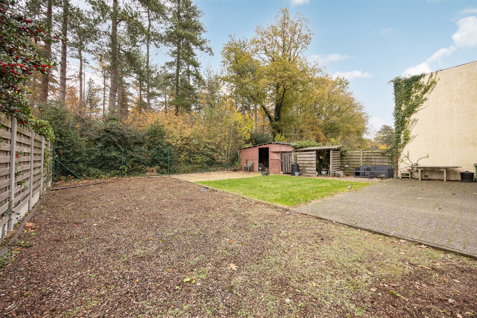 Woning op toplocatie met ruime tuin en zicht op bosgebied. foto 25