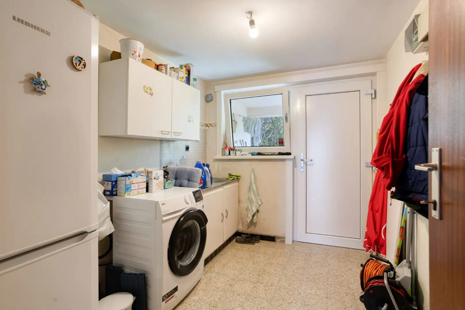 Opbrengsteigendom met tuin en 2 verhuurde appartementen in Wemmel foto 9