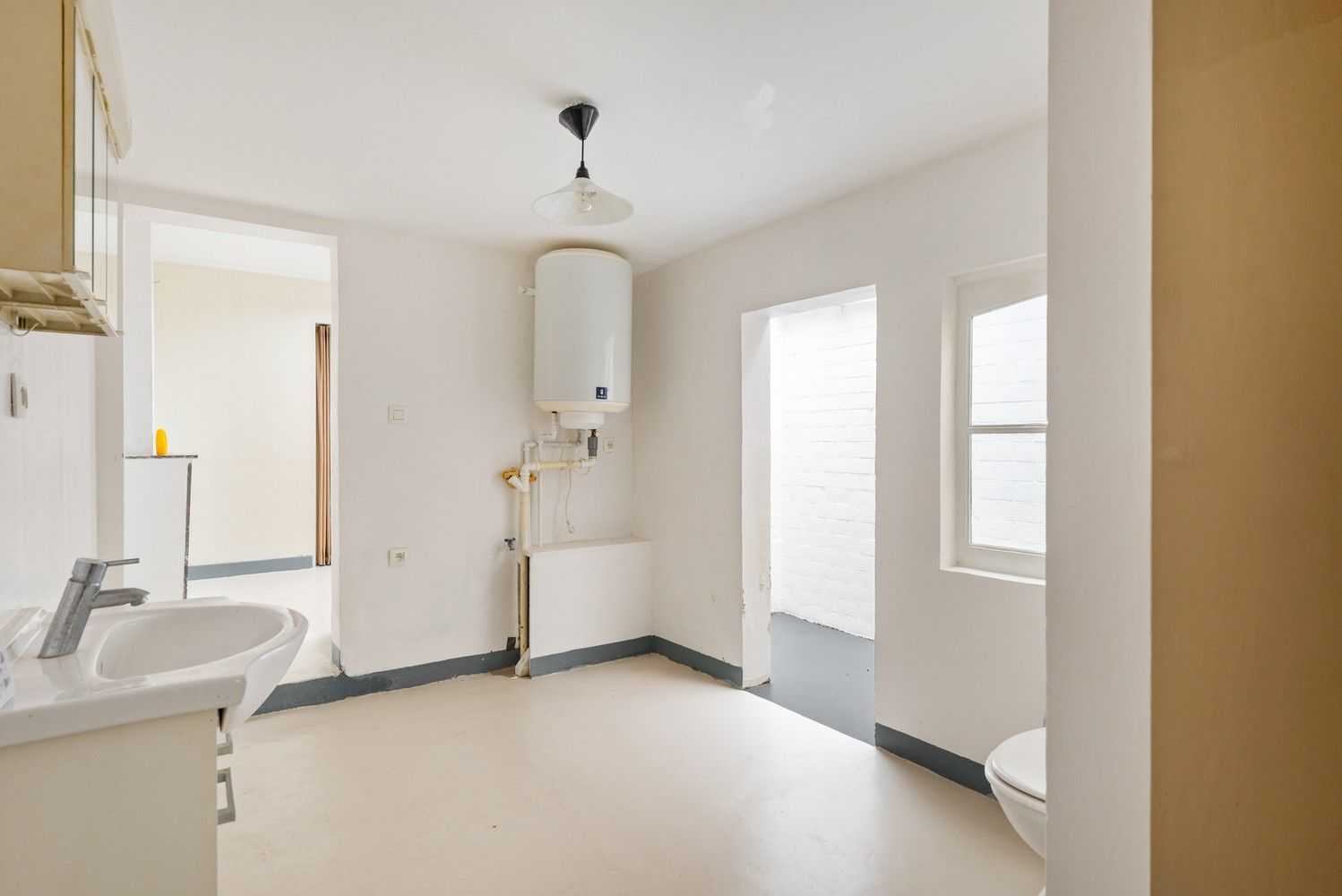Leuke, te renoveren woning met 2 slaapkamers in het centrum van Duffel foto 10