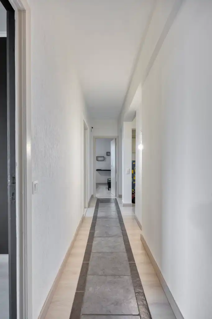 Perfect gerenoveerd instapklaar 3-slaapkamerappartement foto 13