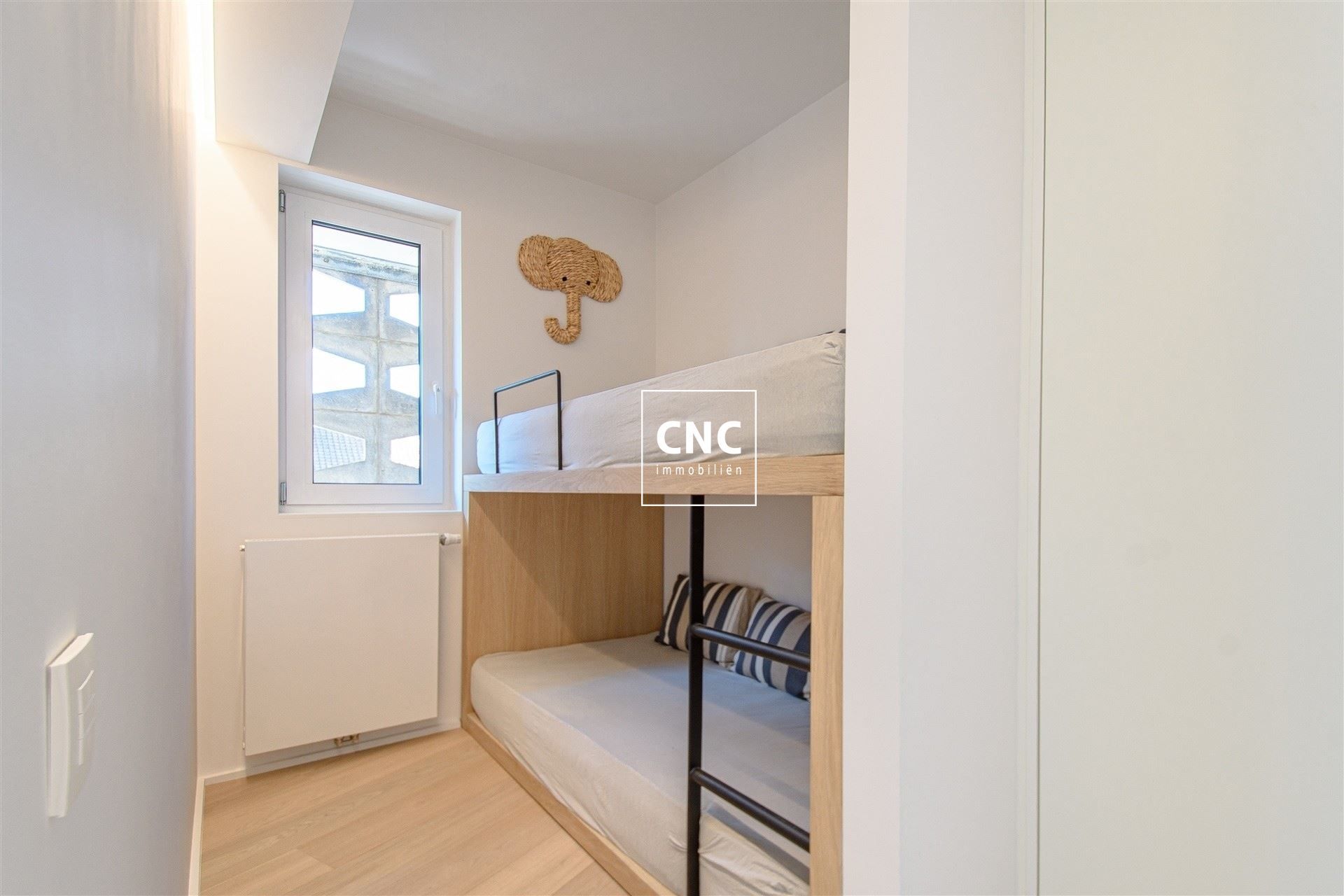 Stijlvol gerenoveerd en zonnig hoekappartement op topligging foto 17