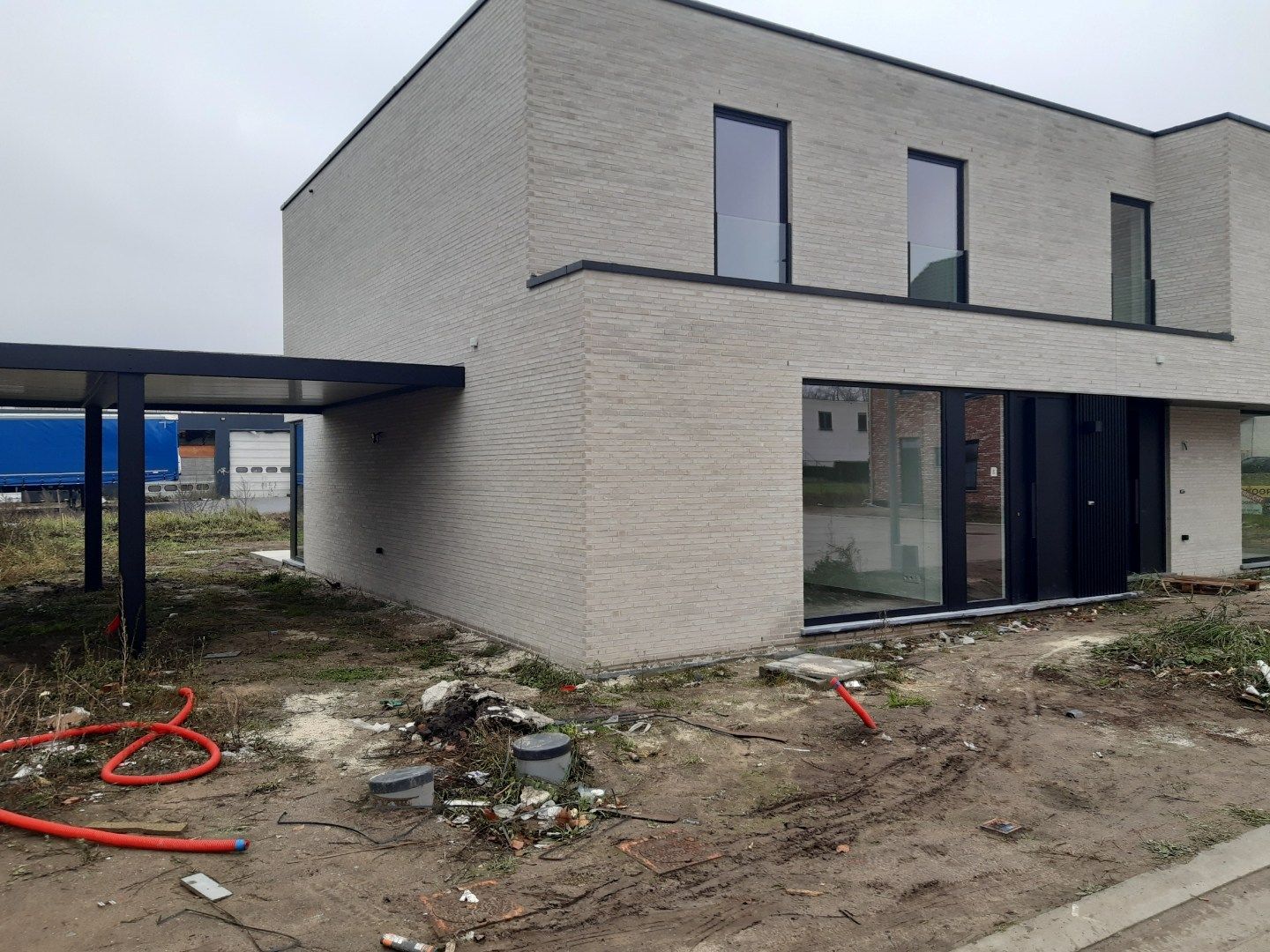 Moderne nieuwbouwwoning te Melle (Merelbeke) foto {{pictureIndex}}