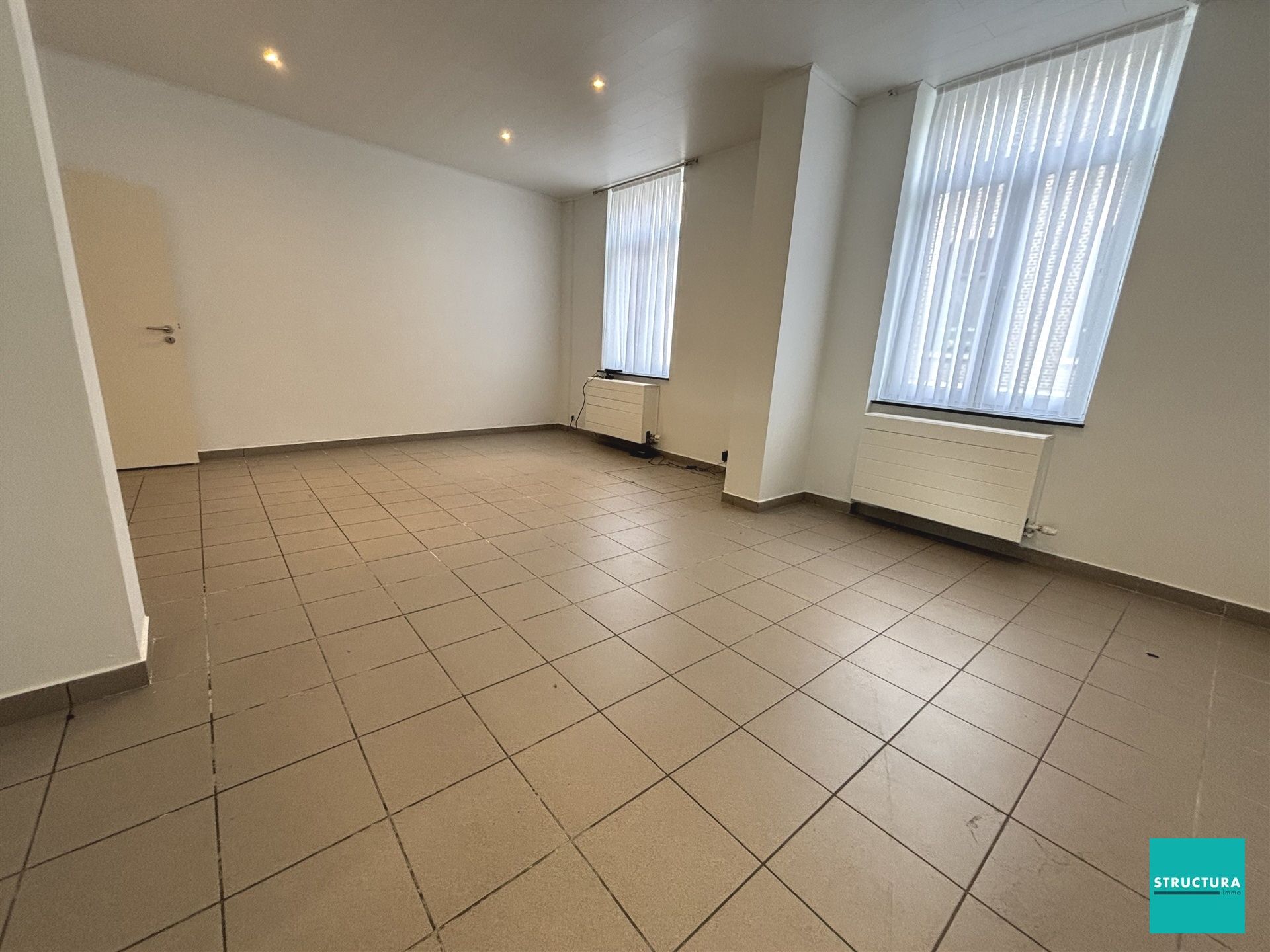 Gelijkvloers appartement met 2 slaapkamers en 2 terrassen foto 2