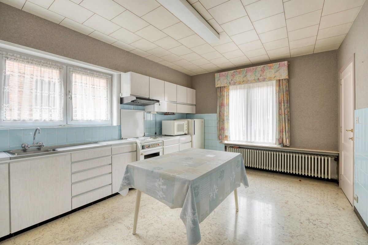 Ruime woning met tuin en 6 slaapkamers foto 10