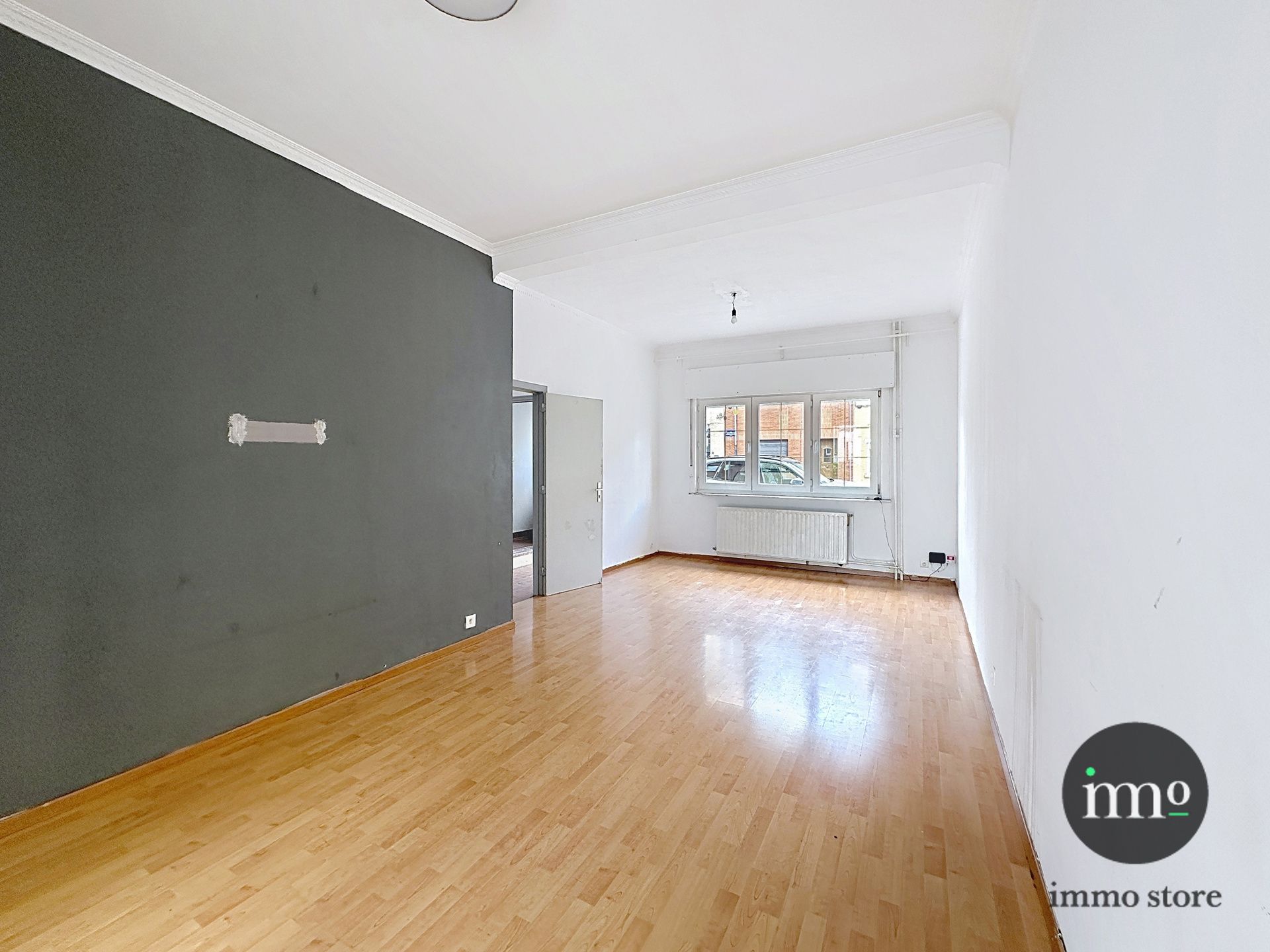 Goedgelegen rijwoning met 3, mogelijks 4 slaapkamers en tuin foto 6