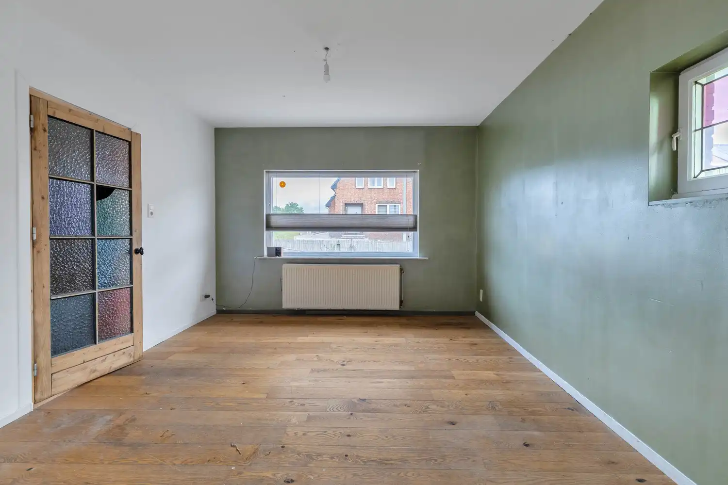 Karaktervolle woning met veel mogelijkheden, een strategische ligging en nabij het Domein Pietersheim foto 5