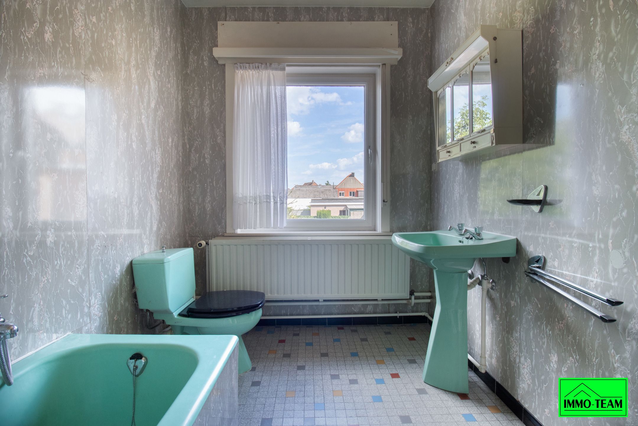 Solide op te frissen 2-gevelwoning met 4 slaapkamers foto 16
