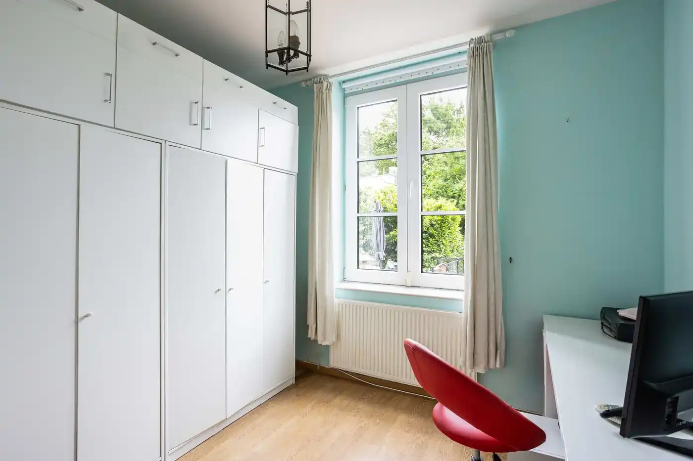 Ruim gelijkvloers appartement met terras en 2 parkeerplekken in Wervik foto 12