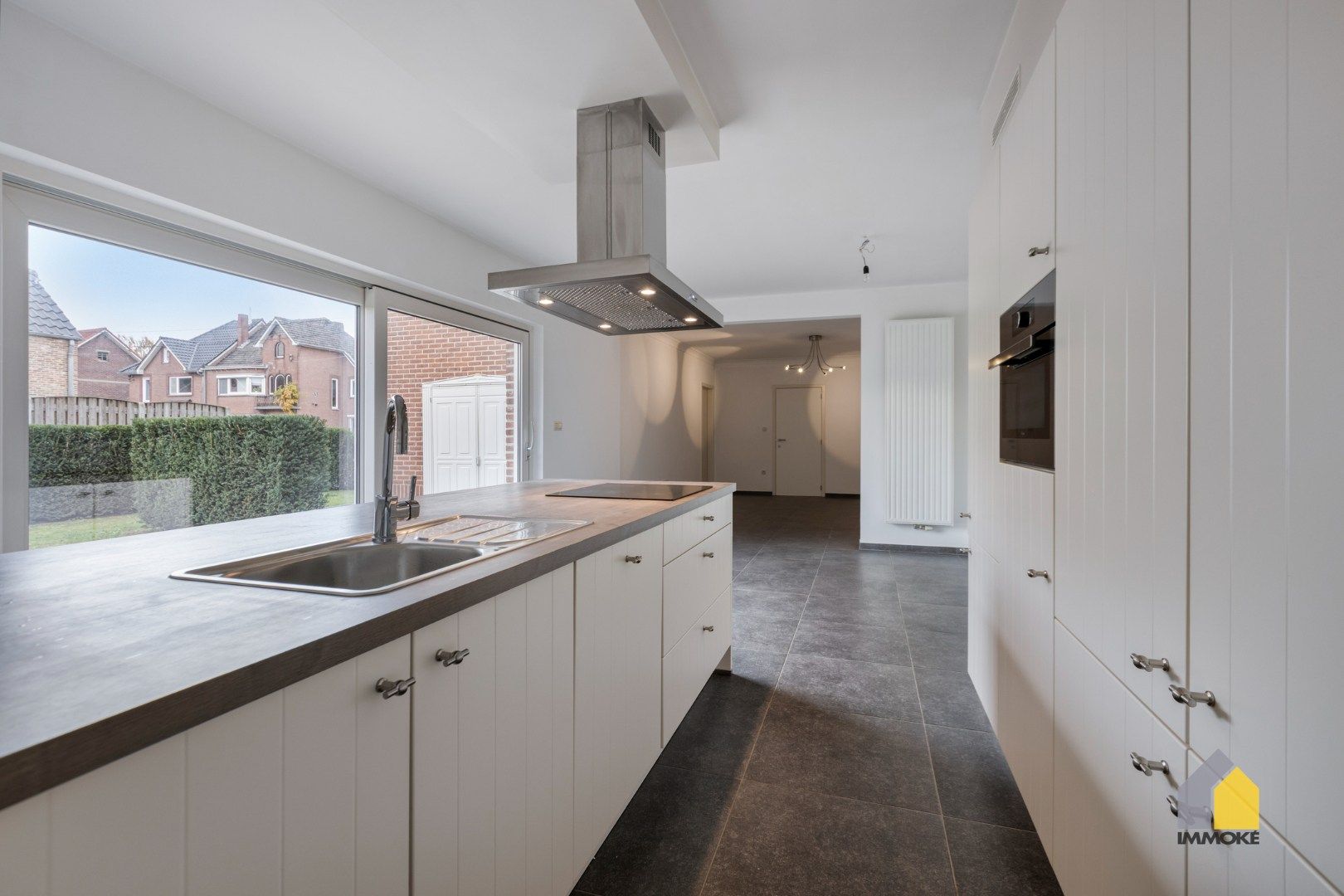 Energiezuinige woning op 3 a 14 ca met 3 slpk, 2 badkamers en knusse tuin. foto 9