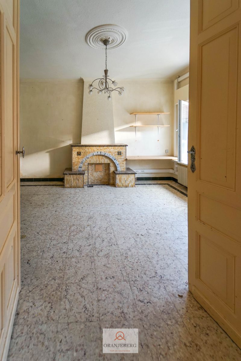 Ideaal te renoveren rijwoning + werkplaats + garage + tuin voor 591m² foto 8