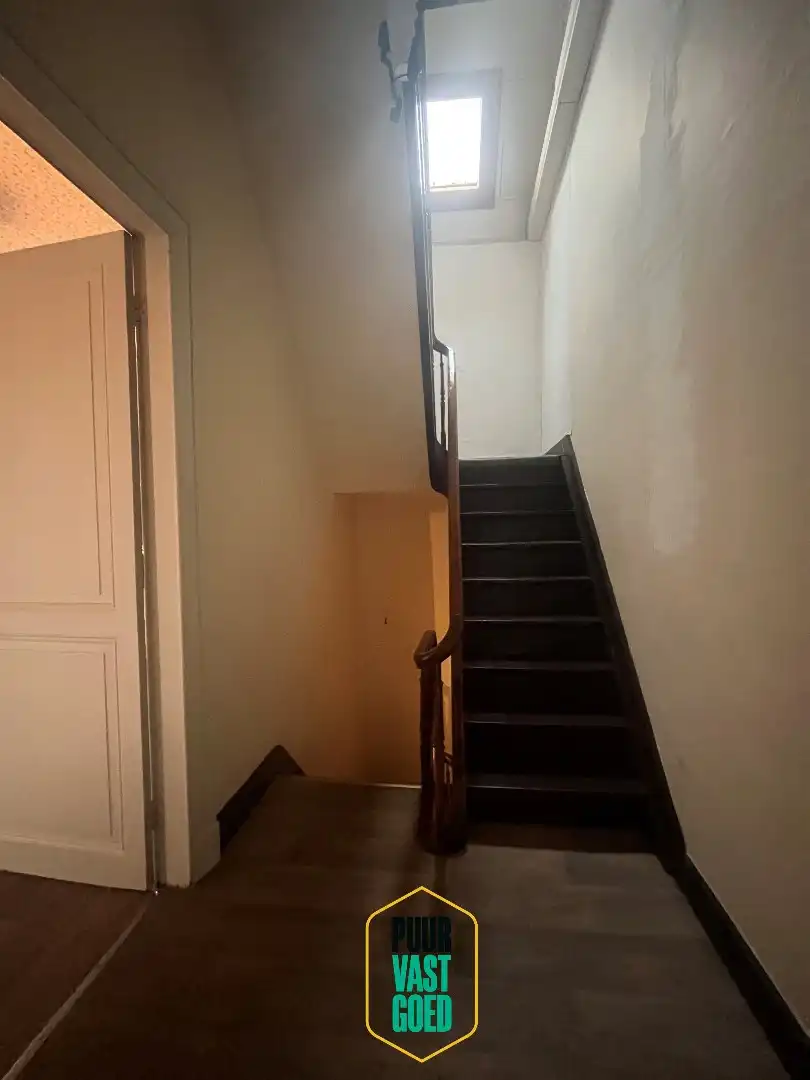 Op te knappen belle-époque woning met 'ziel' en een heel toffe tuin foto 12
