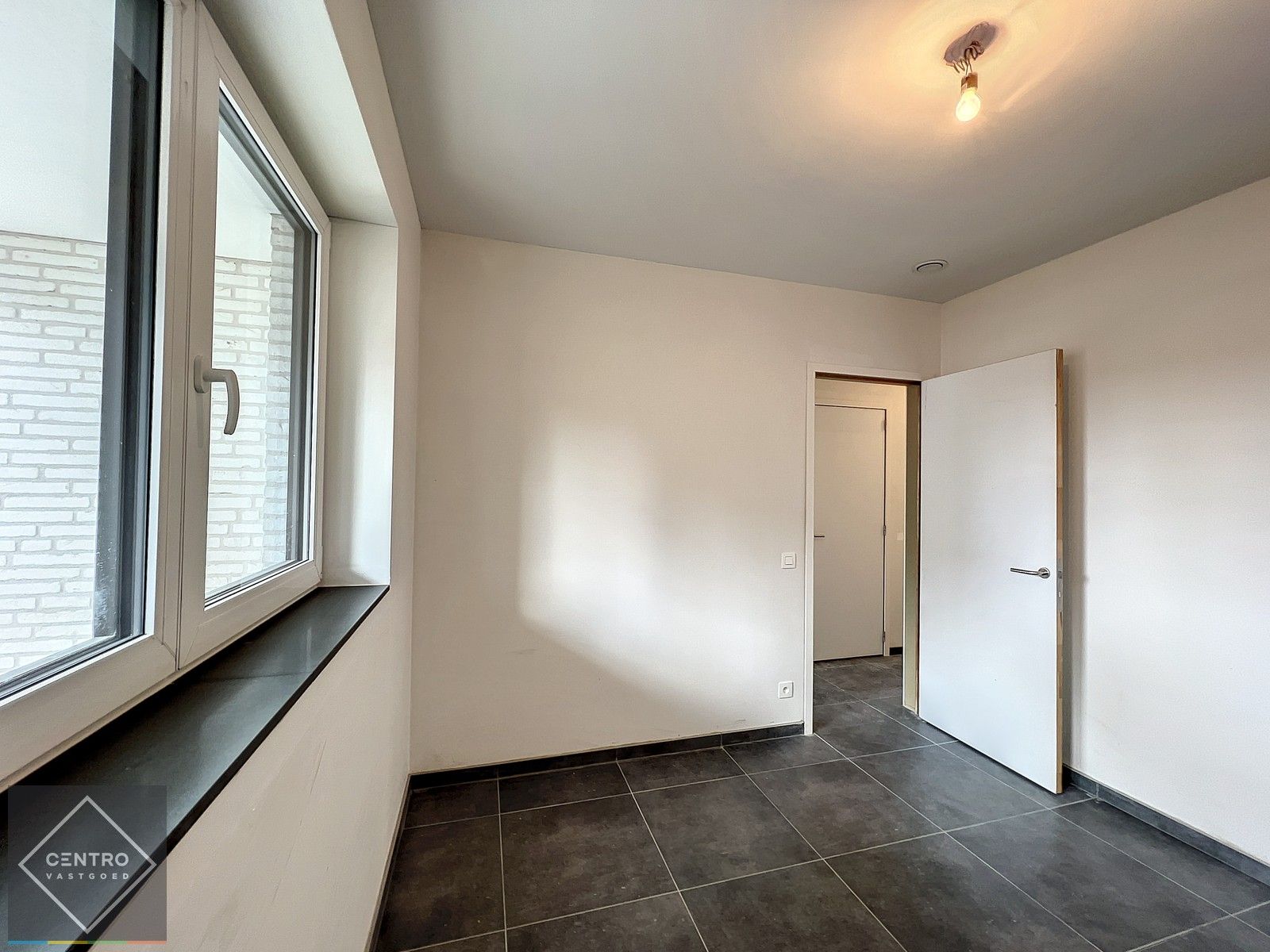 HOEK-PENTHOUSE met 2 slpks, 2 ZONNETERRASSEN en mogelijkheid OVERDEKTE autostaanplaats! foto 23