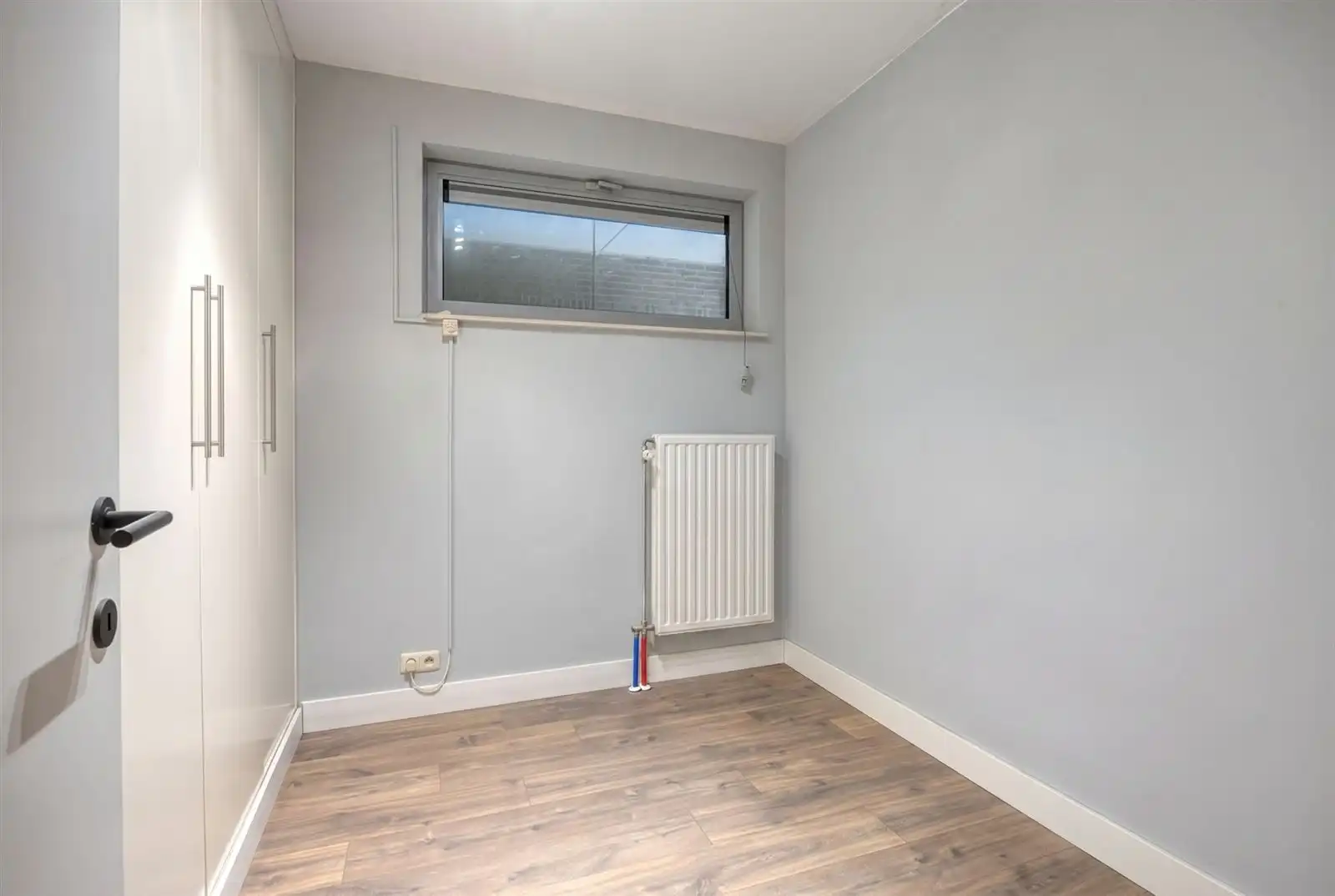 Instapklaar gemeubeld gelijkvloers appartement met tuin nabij het centrum van Edegem foto 14