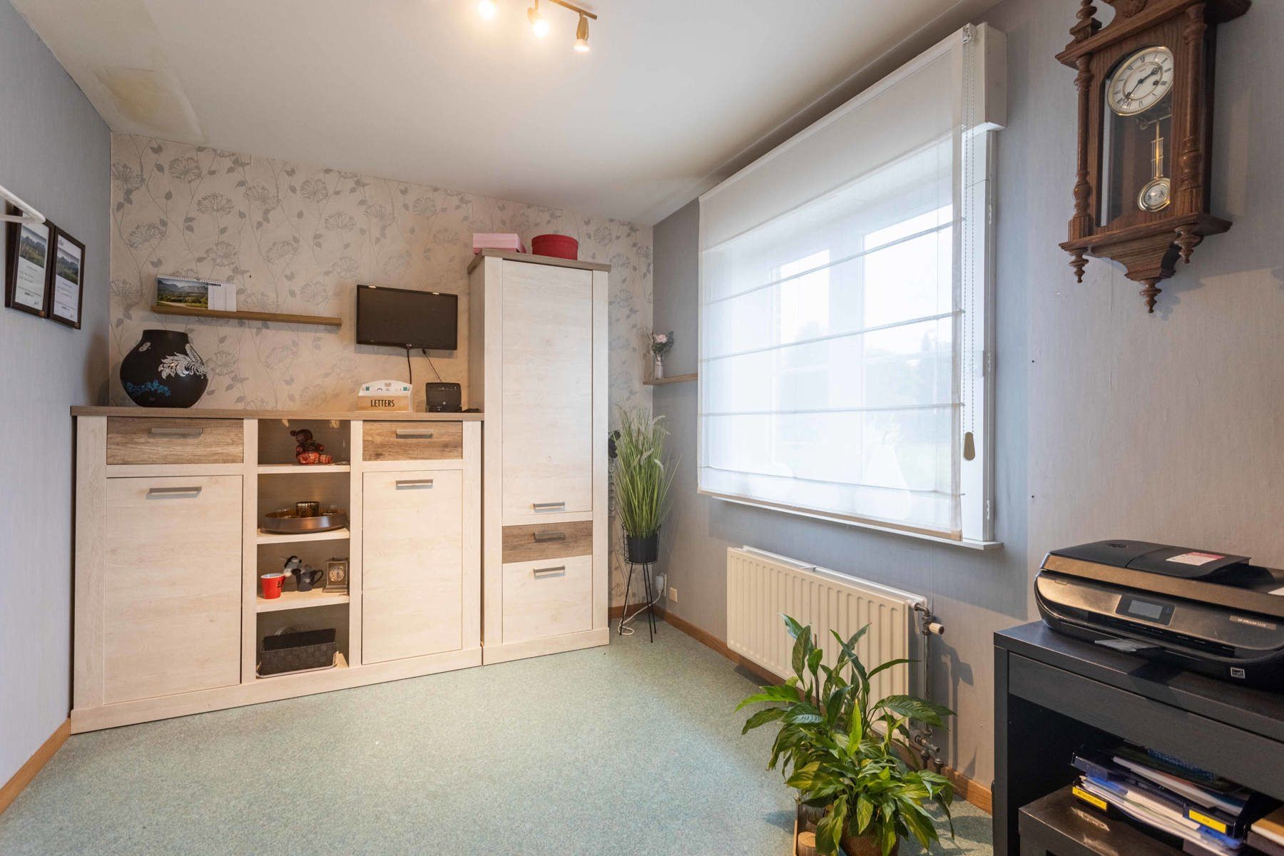 Instapklaar woning met 4 slpk, tuin + dub. garage foto 18
