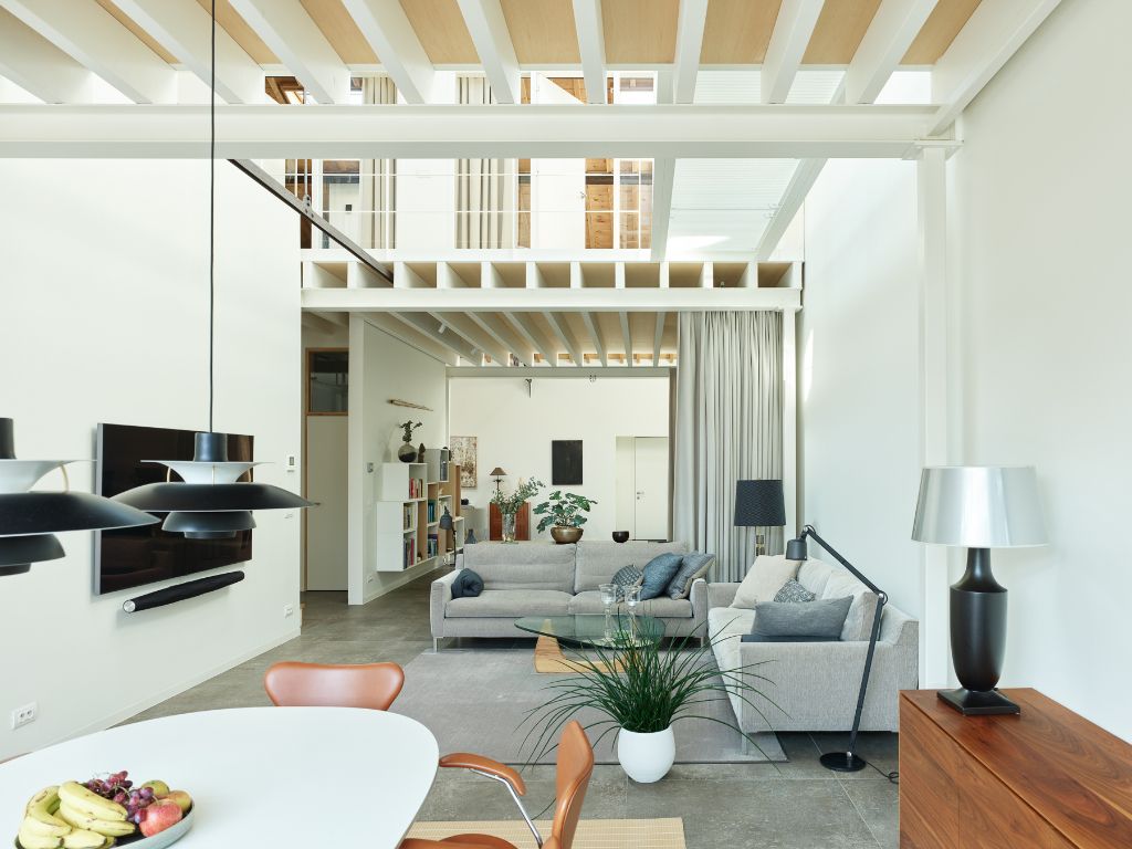 Luxueus en tijdloos – Exceptionele loft met 2 slaapkamers (mogelijkheid tot 3), ontworpen door ‘Plano Architecten’, in een beschermd gebouw met een rijkelijke industriële voorgeschiedenis. foto 21