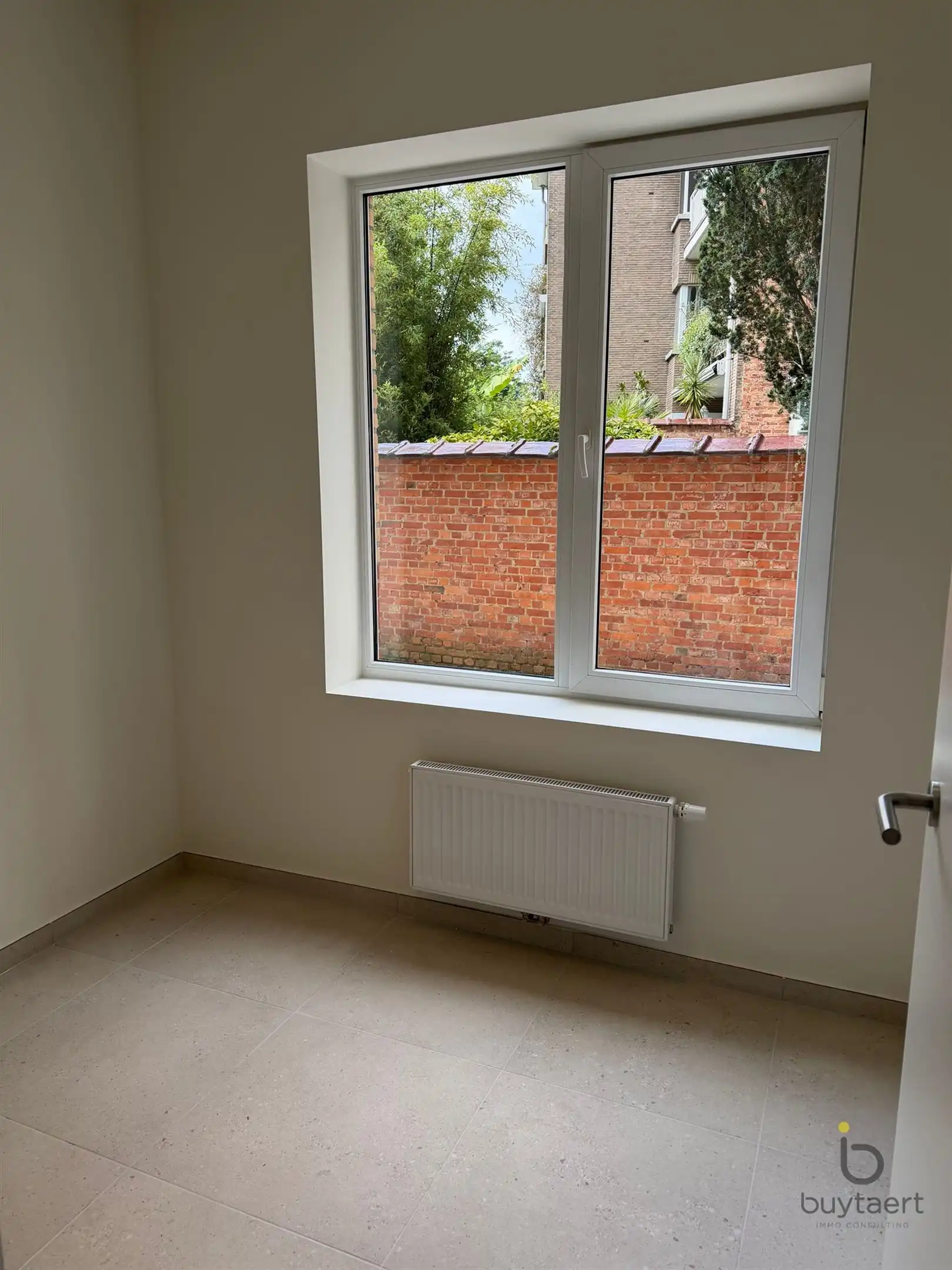 Gerenoveerd gelijkvloers appartement aan de Singel. foto 8