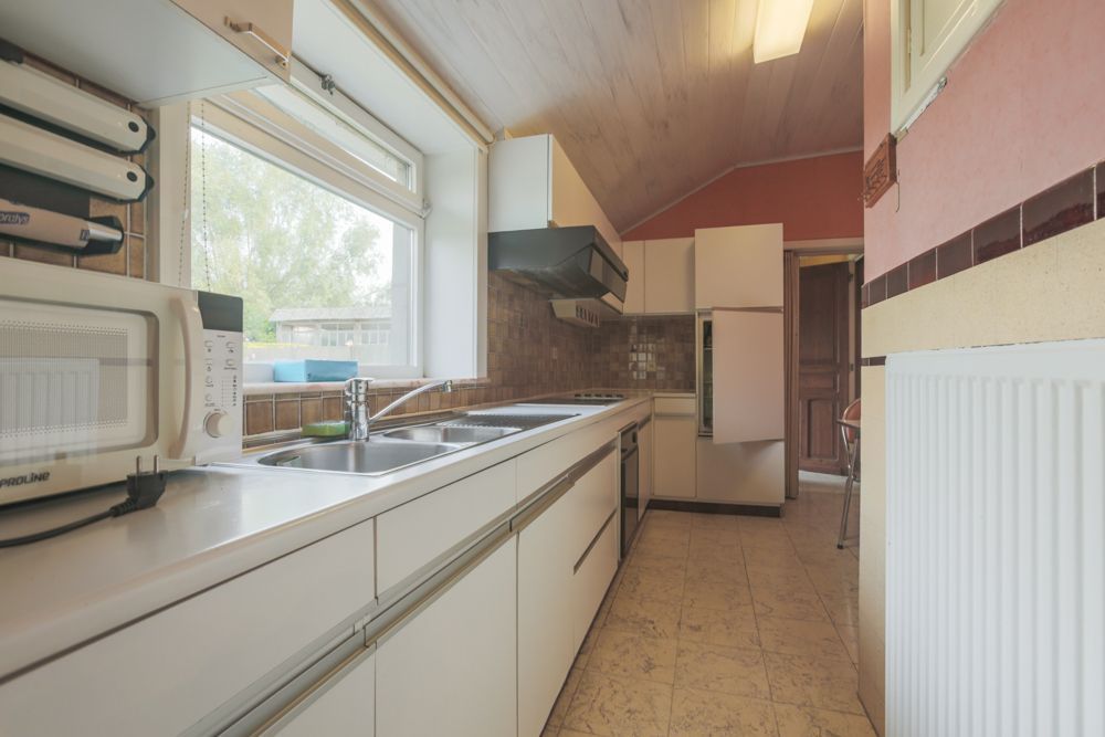 Hoeve met stallen op 3780 m² aan de grens met Elsegem foto 16