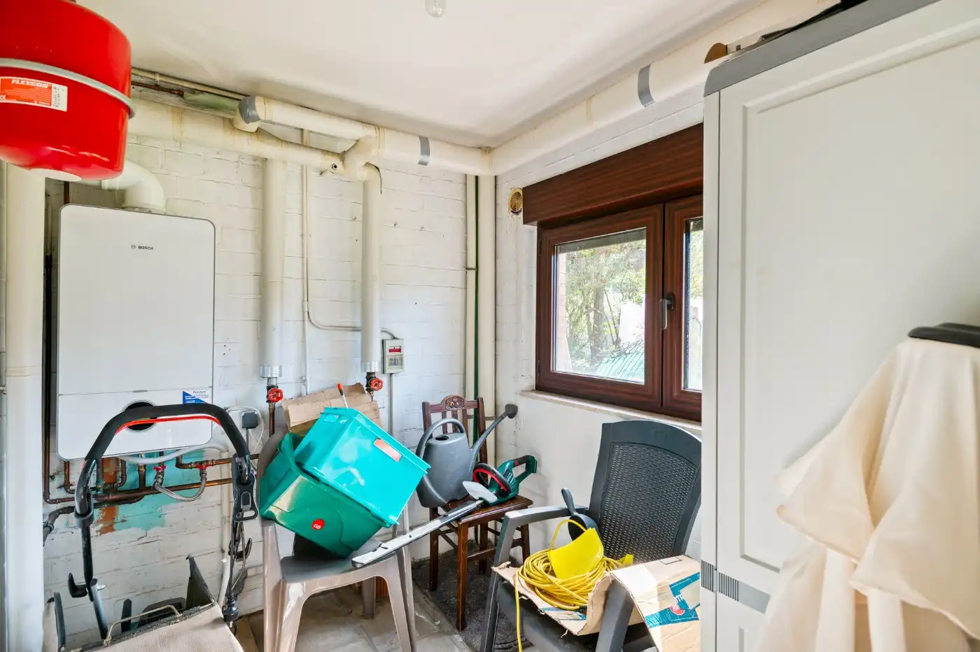 Op te frissen woning met 3 slpk., inpandige garage en west-tuin foto 22