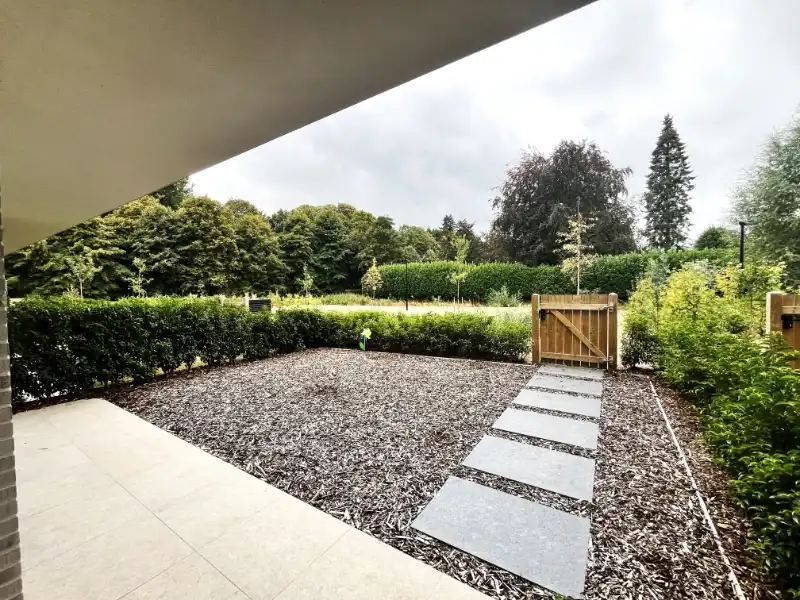 Gelijkvloers app met 1 slpkm, tuin, staanplaats en kelderberging foto 2