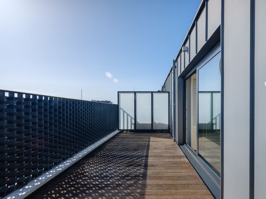 Ruim en lichtrijk duplexappartement met 2 slaapkamers, meerdere terrassen en staanplaats aan Ter Platen foto 15