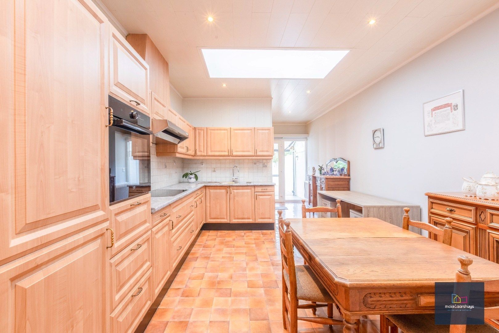 Charmante op te frissen rijwoning met ruime stadstuin  foto 9