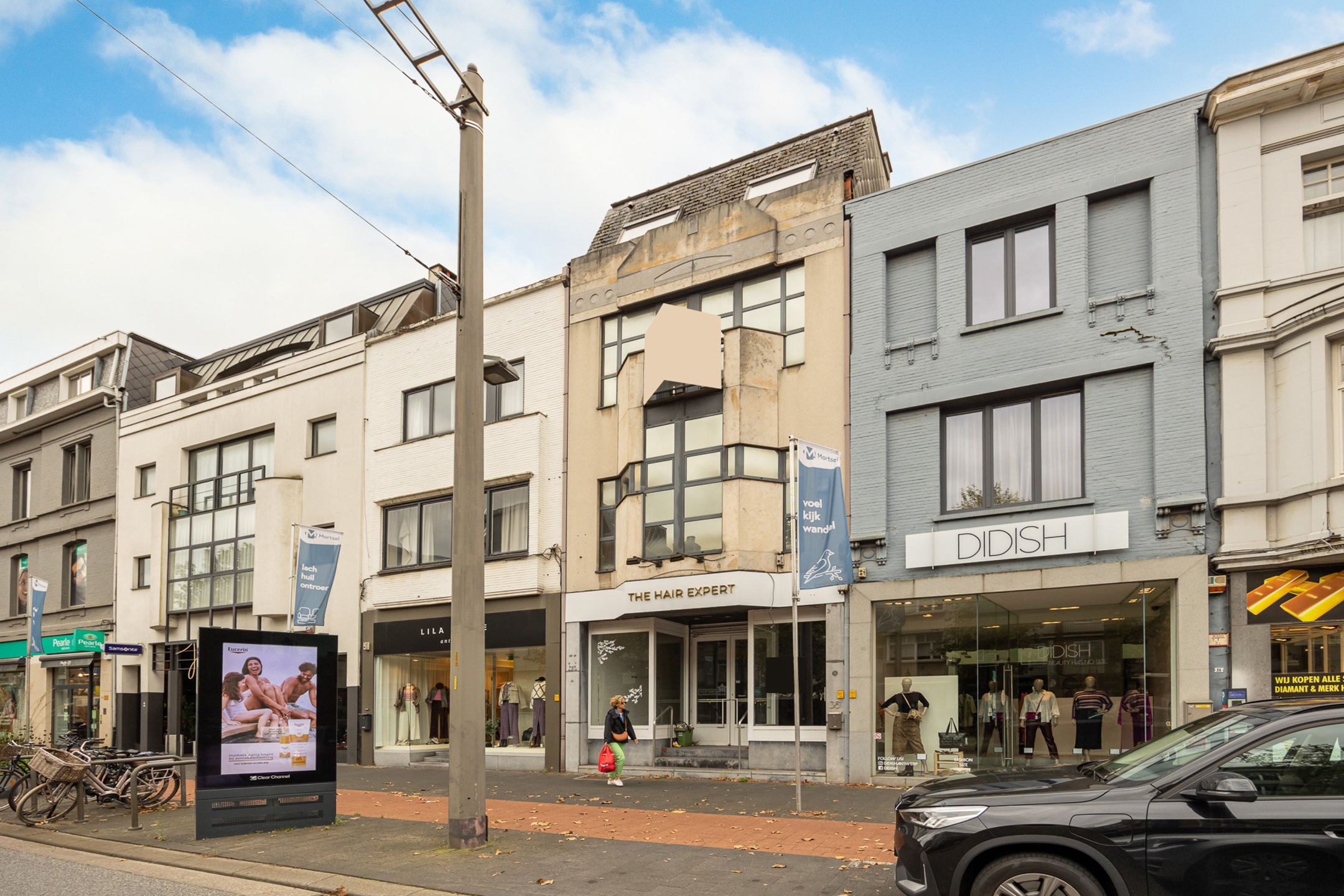 Handelshuis te koop in centrum Mortsel!  foto {{pictureIndex}}