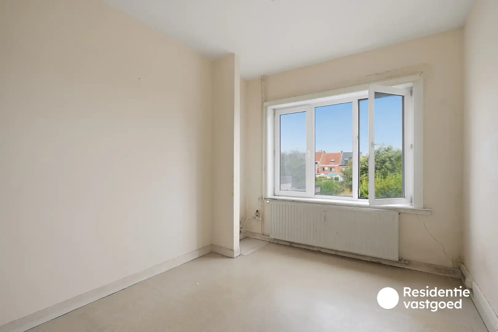 Interessante investeringseigendom met 2 vergunde appartementen, garage en ruime tuin! foto 7