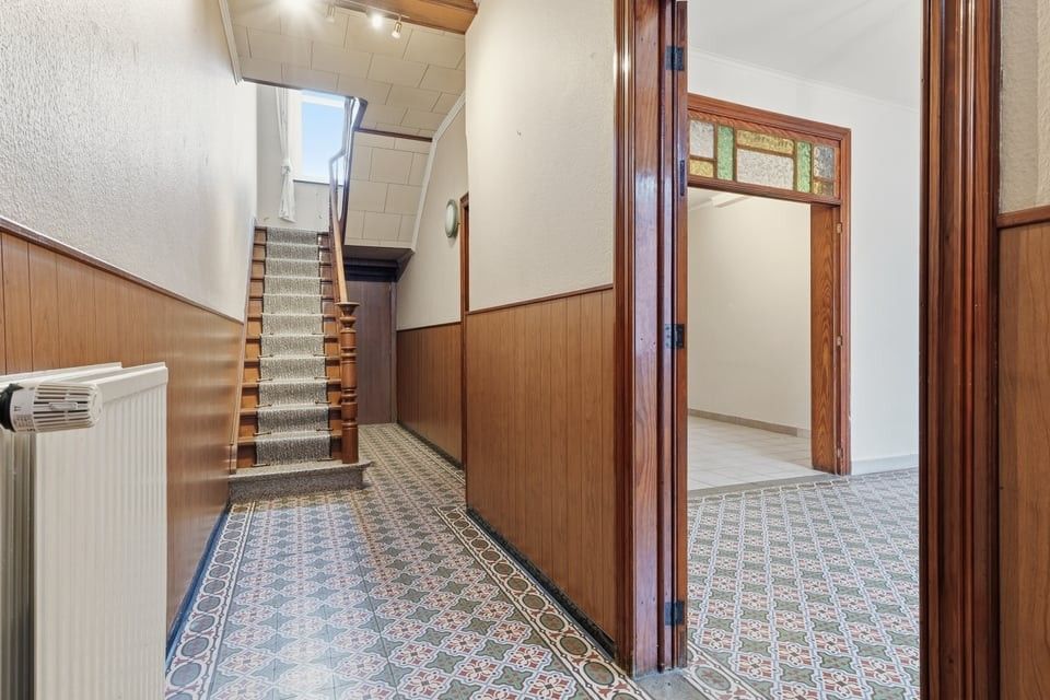 CHARMANTE WONING MET KARAKTER, RUIMTE EN UITZONDERLIJK POTENTIEEL OP RUIM PERCEEL foto 3