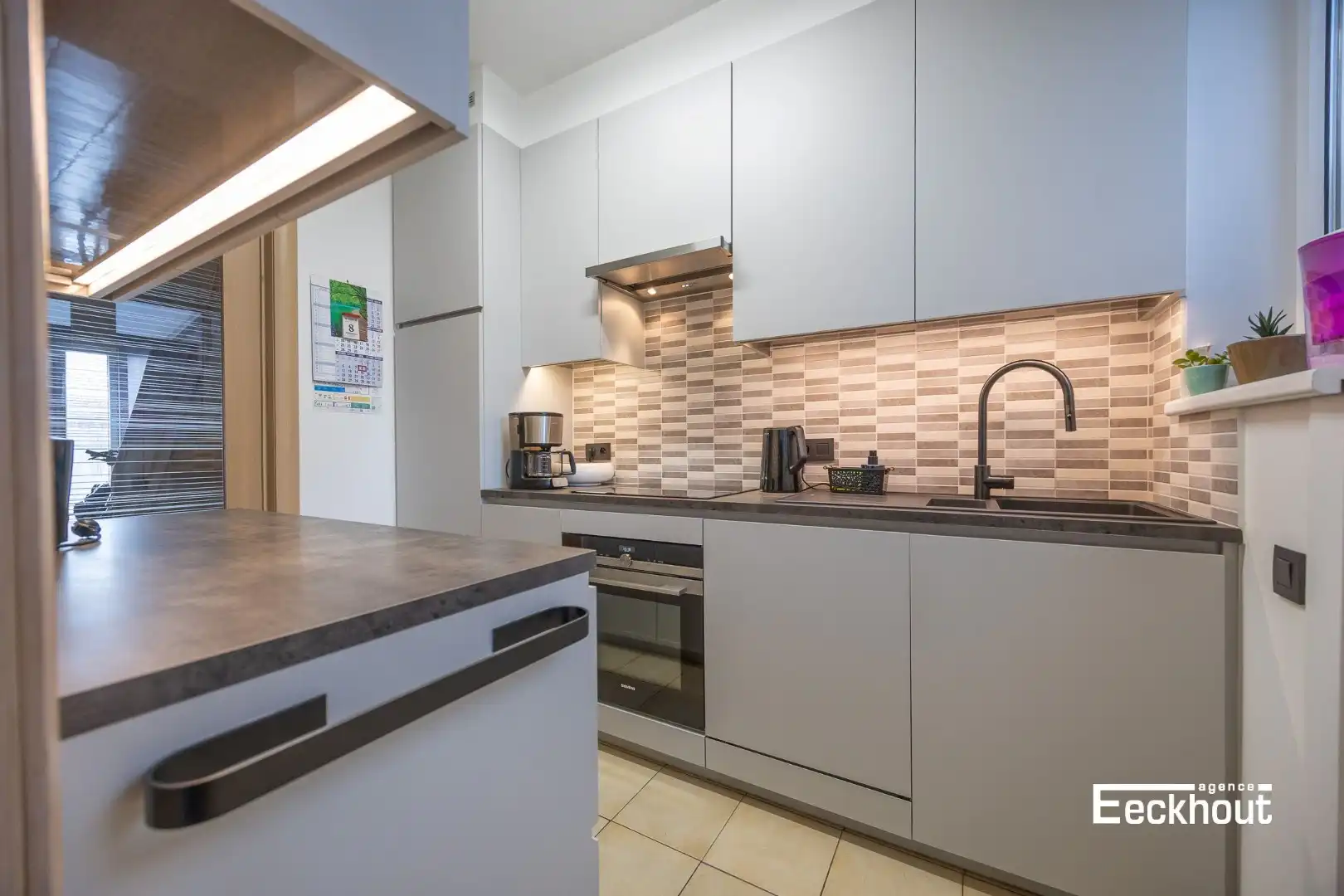 Instapklare woning met zonnige tuin op zeer gunstige ligging! foto 8