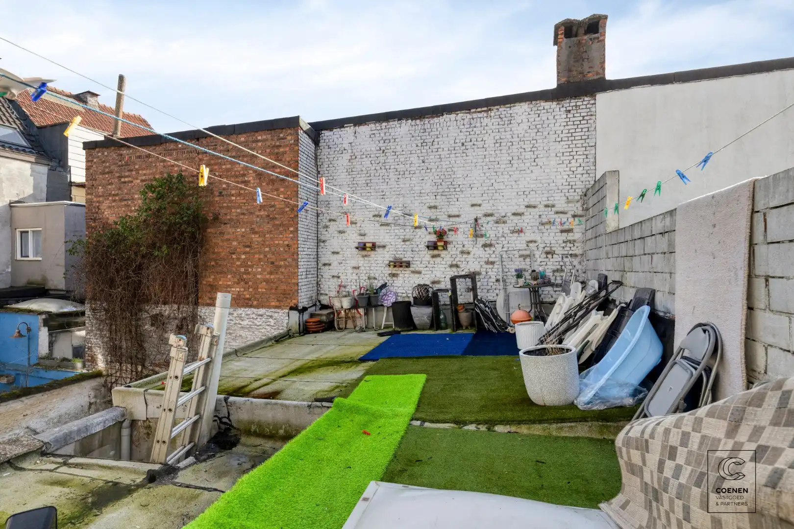 Ruime handelswoning, momenteel ingericht als handelsruimte en 2 appartementen op goede ligging te Antwerpen! foto 32