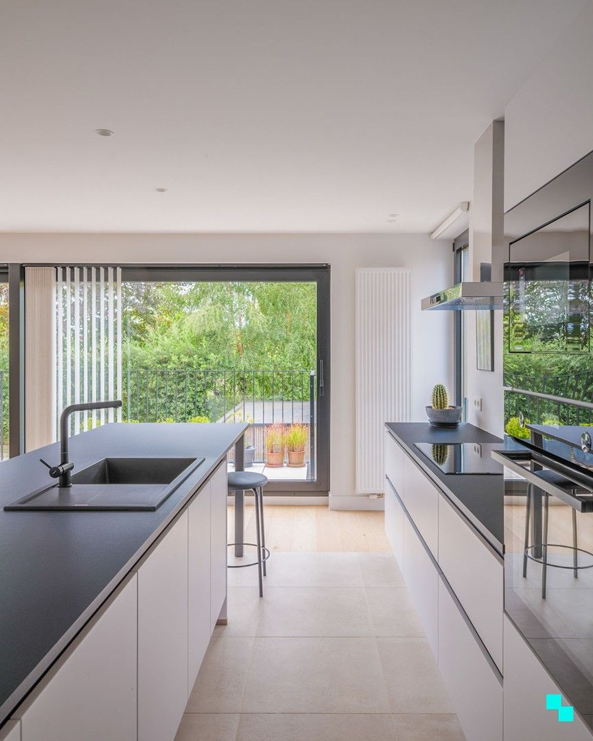 Zonnig appartement met twee slaapkamers te Balegem dorp foto 4