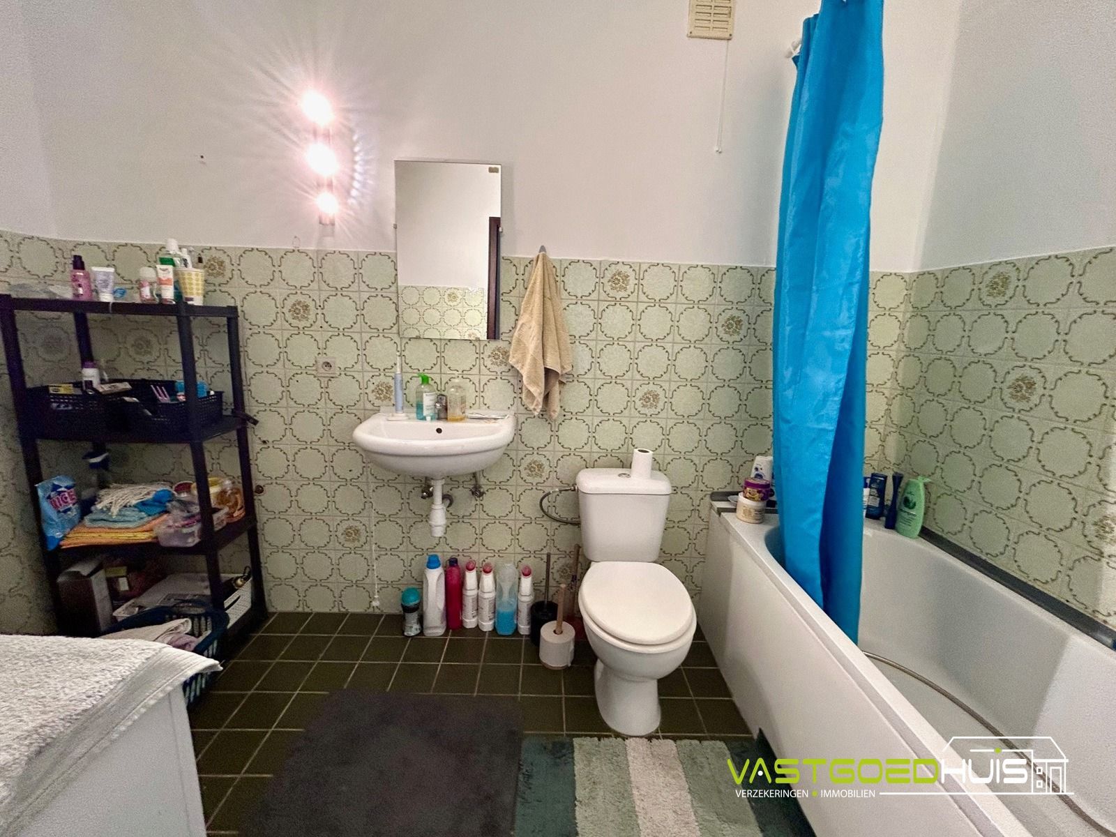 Ruim, gelijkvloers appartement met terras foto 18