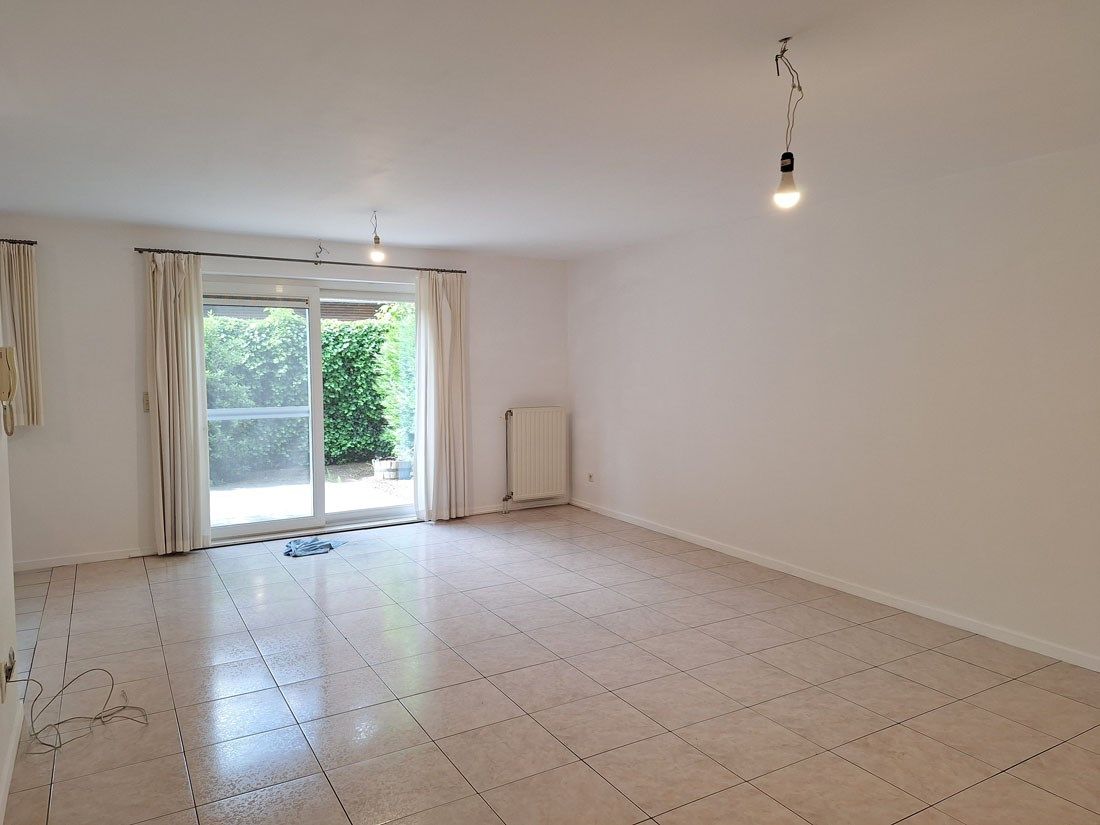 Stijlvol gelijkvloers appartement met terras en autostandplaats foto 8