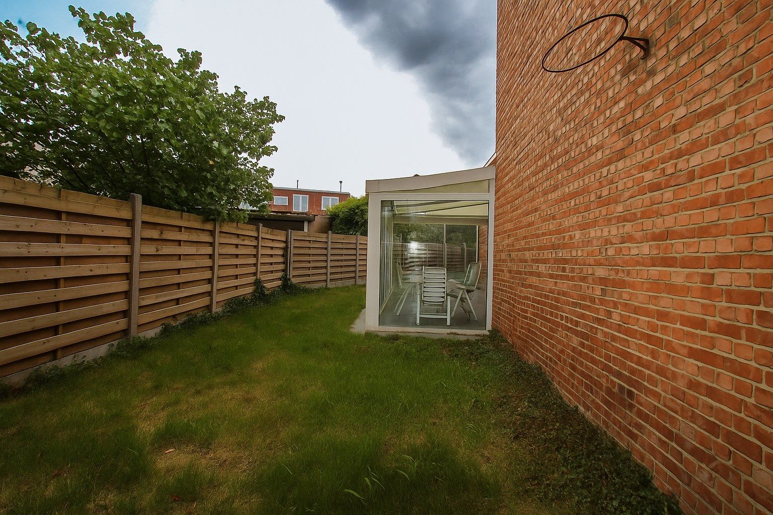 Te koop: Ruime en charmante halfopen bebouwing met uitgestrekte tuin, optie tot vijf slaapkamers en veel renovatiepotentieel in het centrum van Sint-Niklaas foto 15