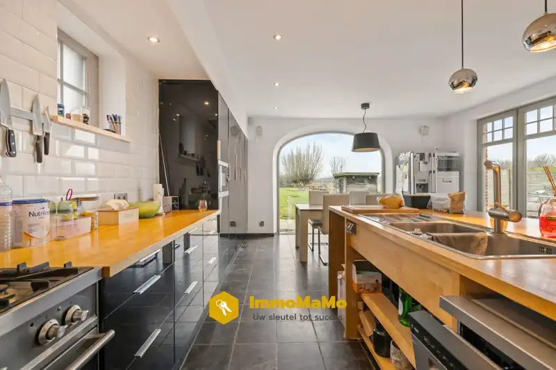 LANDELIJKE WONING MET ENORM RUIME TUIN TE KOOP IN WACHTEBEKE foto 25