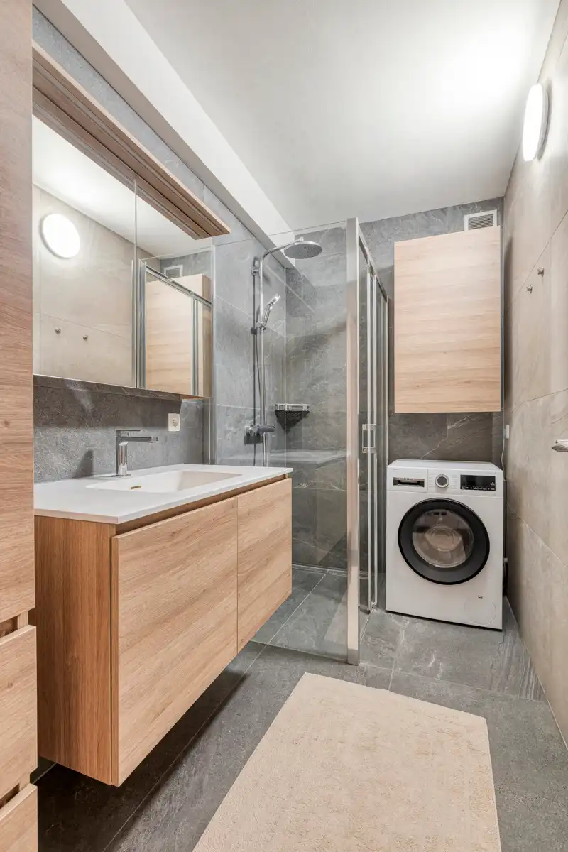 Leemans Immobiliën biedt u dit instapklare gelijkvloers appartement aan, gelegen op een uitstekende centrale locatie in het hart van Zellik foto 14