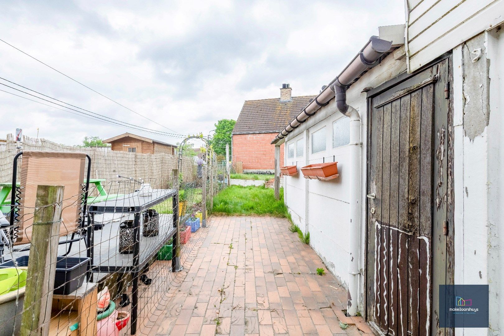 Rijwoning met tuin te Wetteren.  foto 17