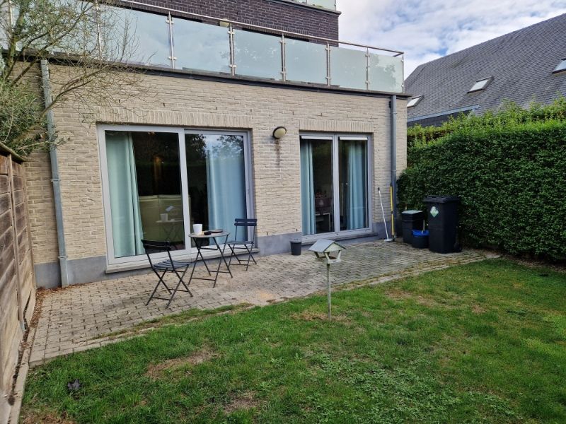 Prachtig gelijkvloersappartement met 2 slaapkamers,  tuin en garage foto 14