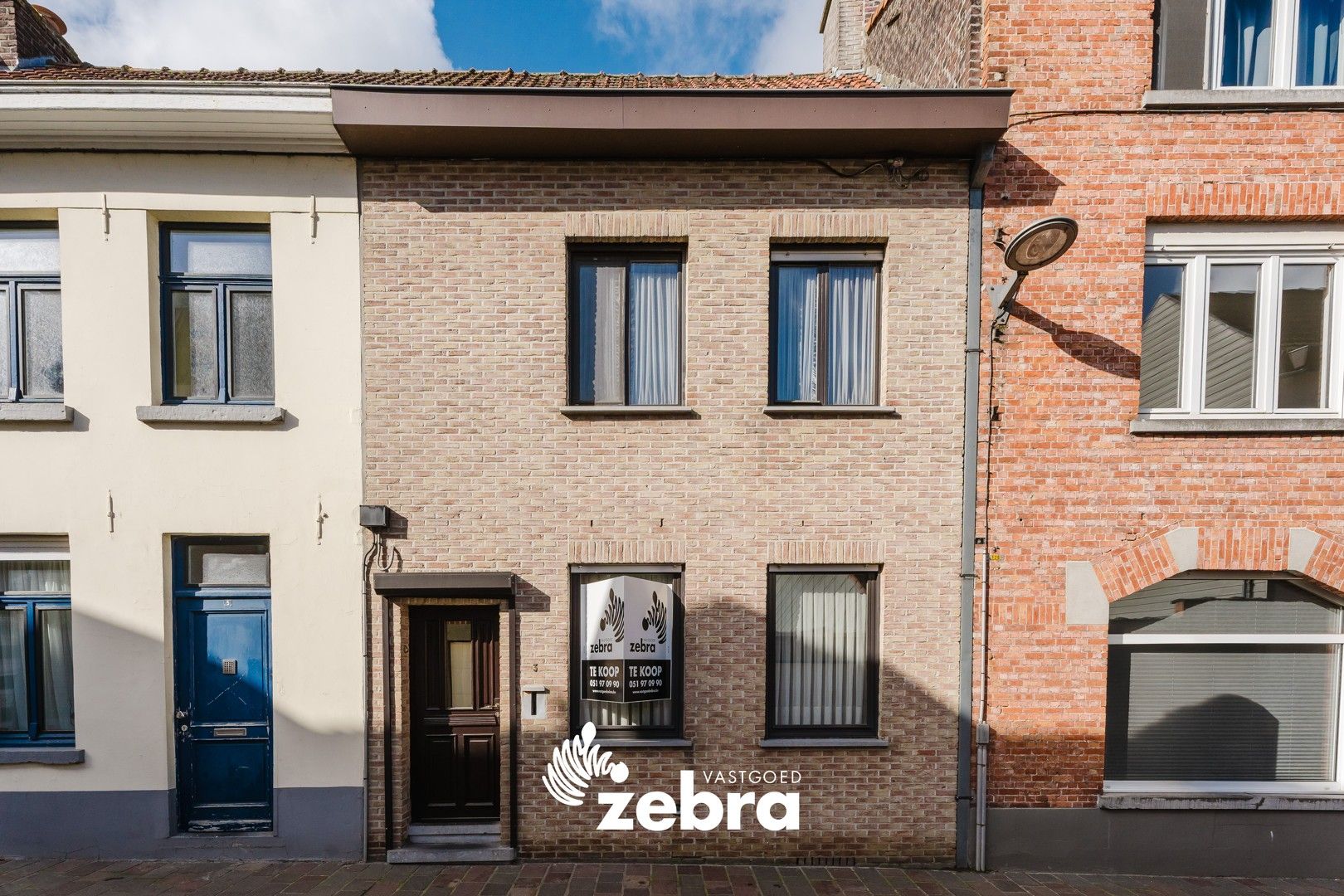 Te renoveren woning op een steenworp van de markt in Tielt! foto 16