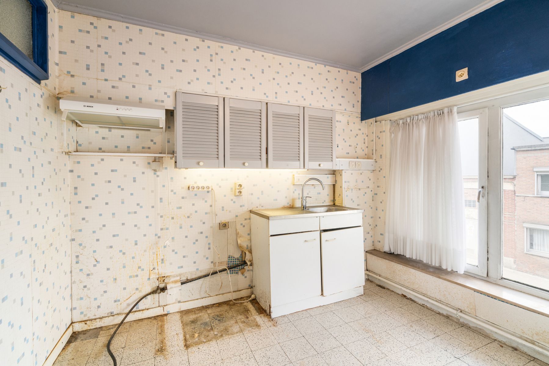 Te renoveren 2-slaapkamer appartement in het centrum van Erembodegem foto 6