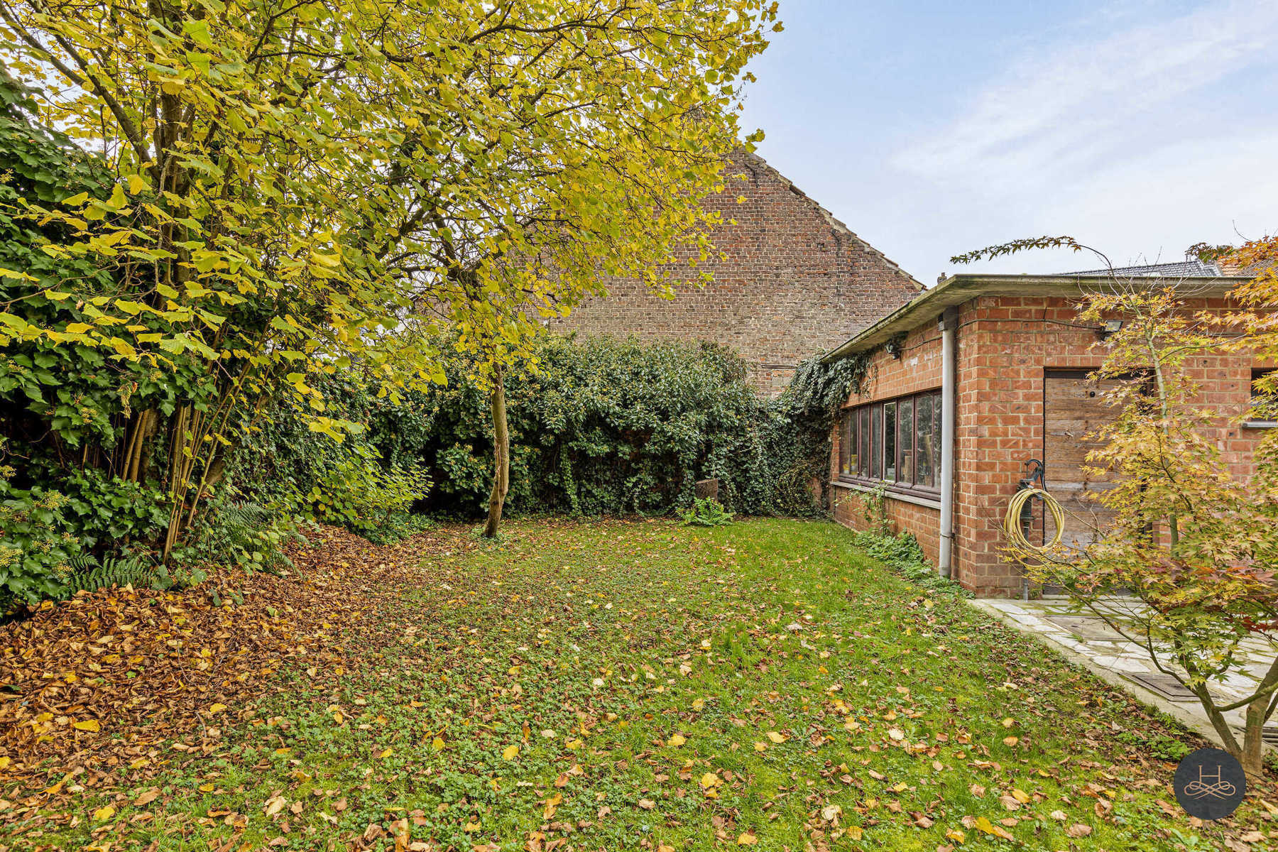 Op te frissen woning onder de kerk van Rotselaar foto 29